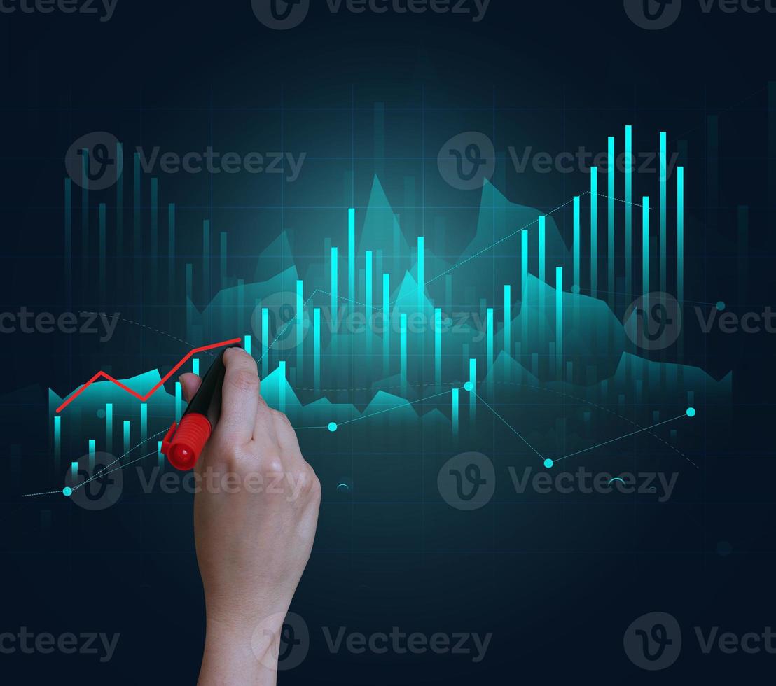 Holographic graph with growing indicators and a woman's hand. Business growth concept, profitable startup photo