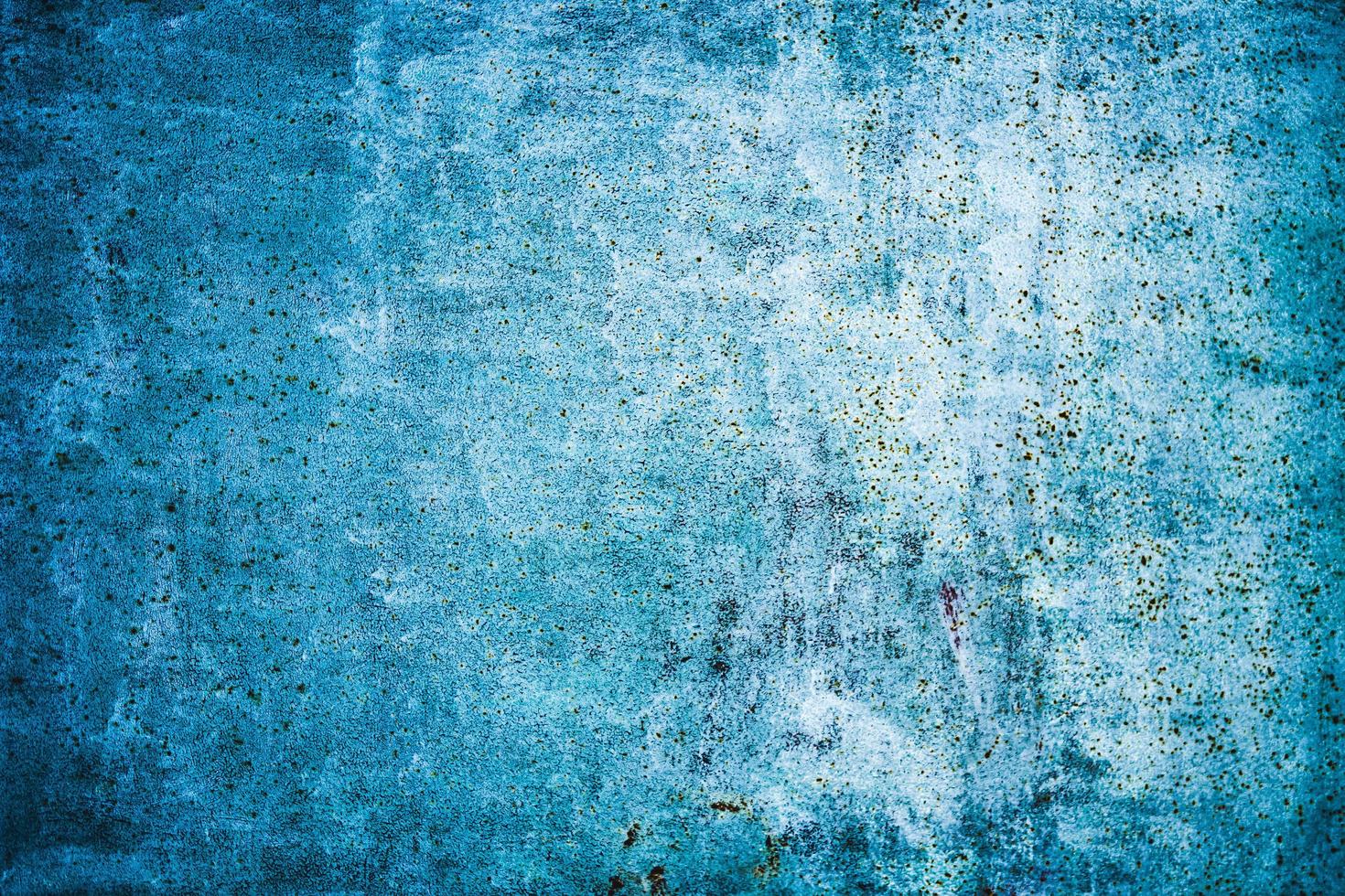 Rough painted metal surface with rusty dots background. photo