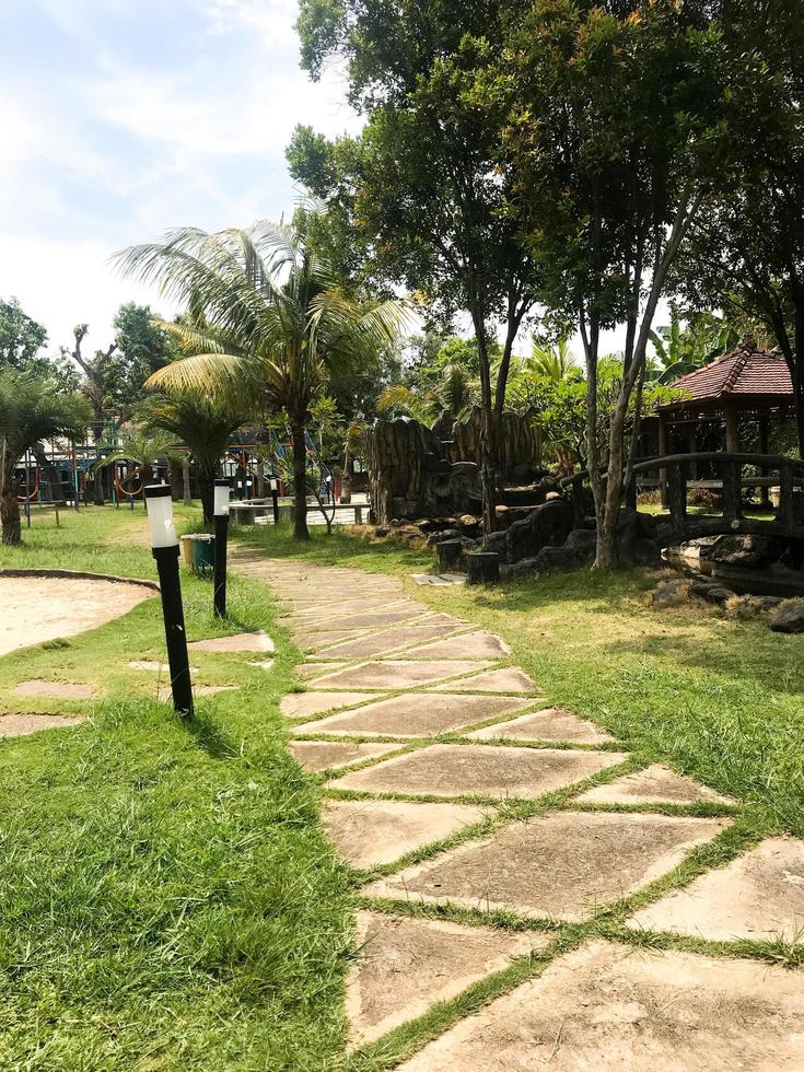 The play park for children is wrapped in red barrier tape. Outside. Prohibition of outdoor walks. photo