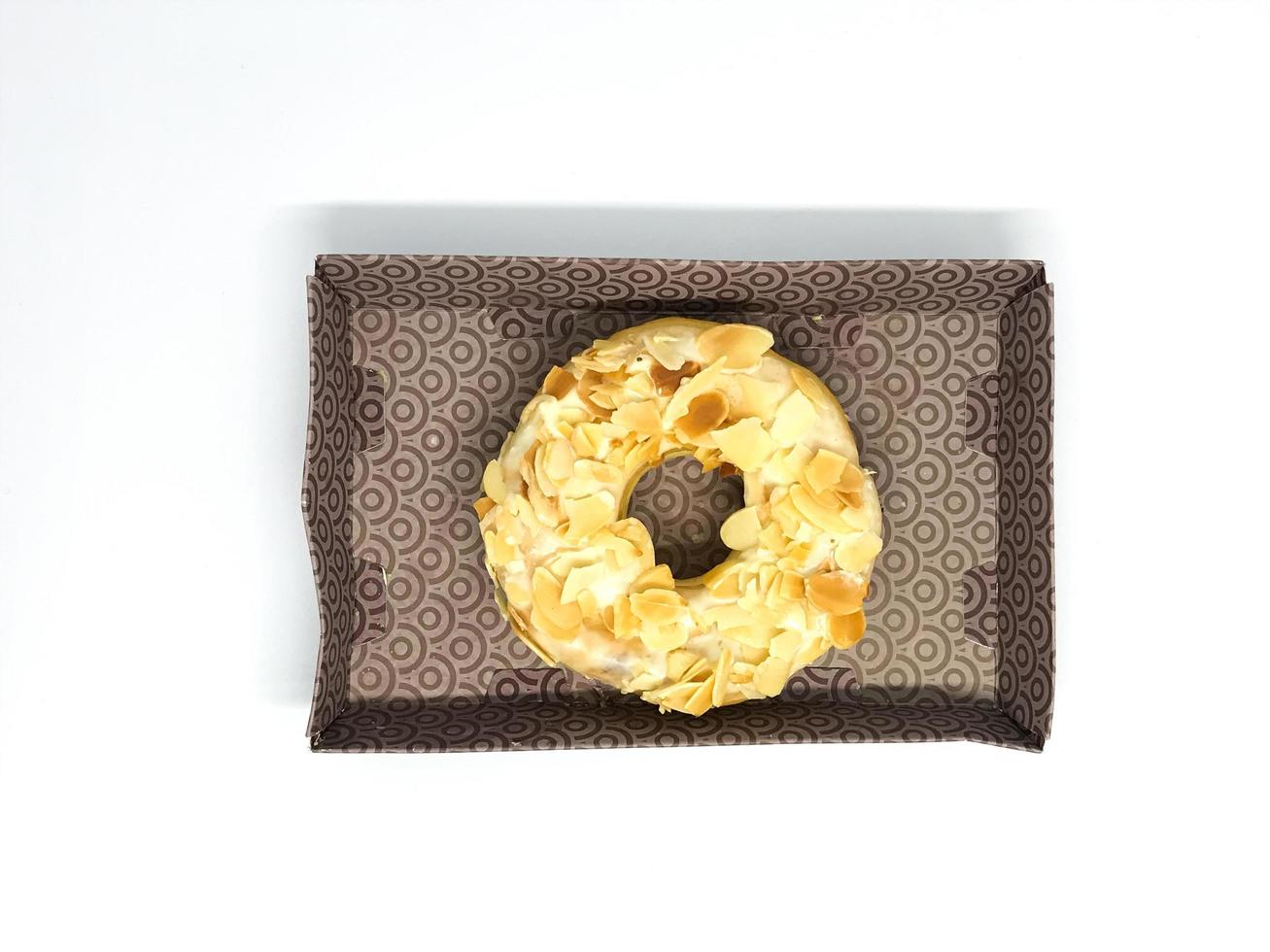 donut with sprinkled almonds photo