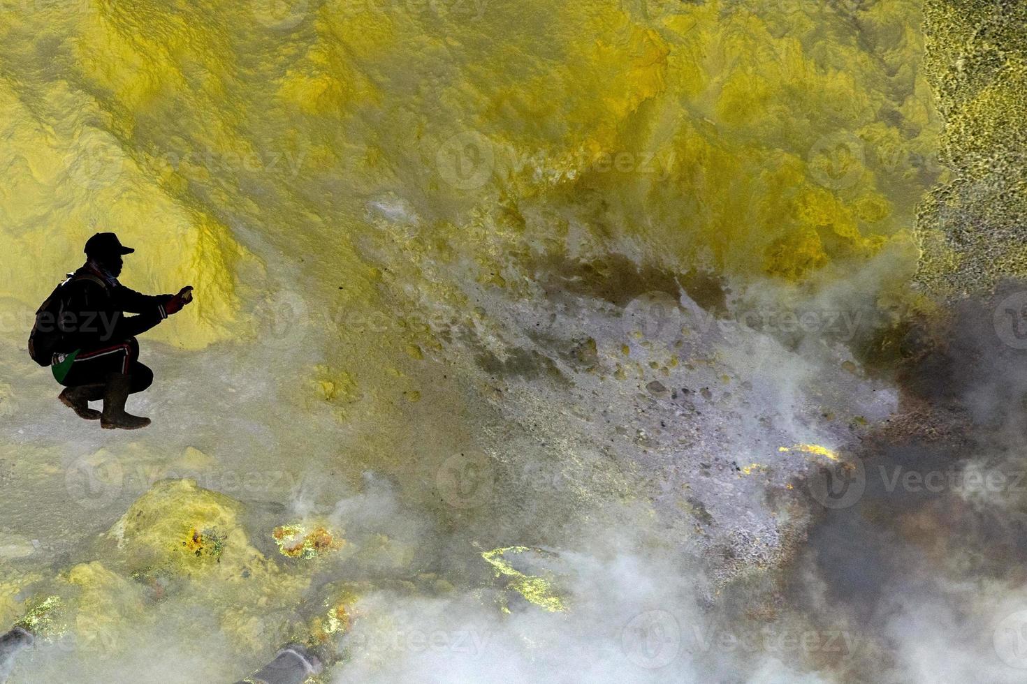 yellow sulfur mine ijen volcano at sunrise panorama landscape view photo