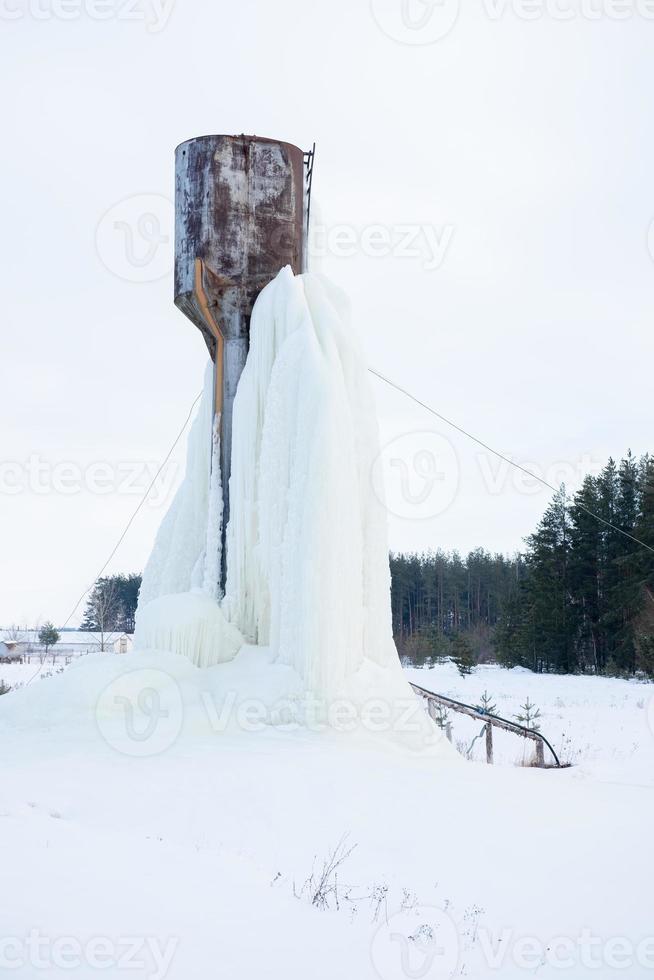 frozen water tower. The water turned to ice. Abnormal cold photo