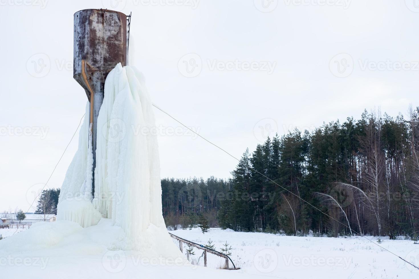 frozen water tower. The water turned to ice. Abnormal cold photo