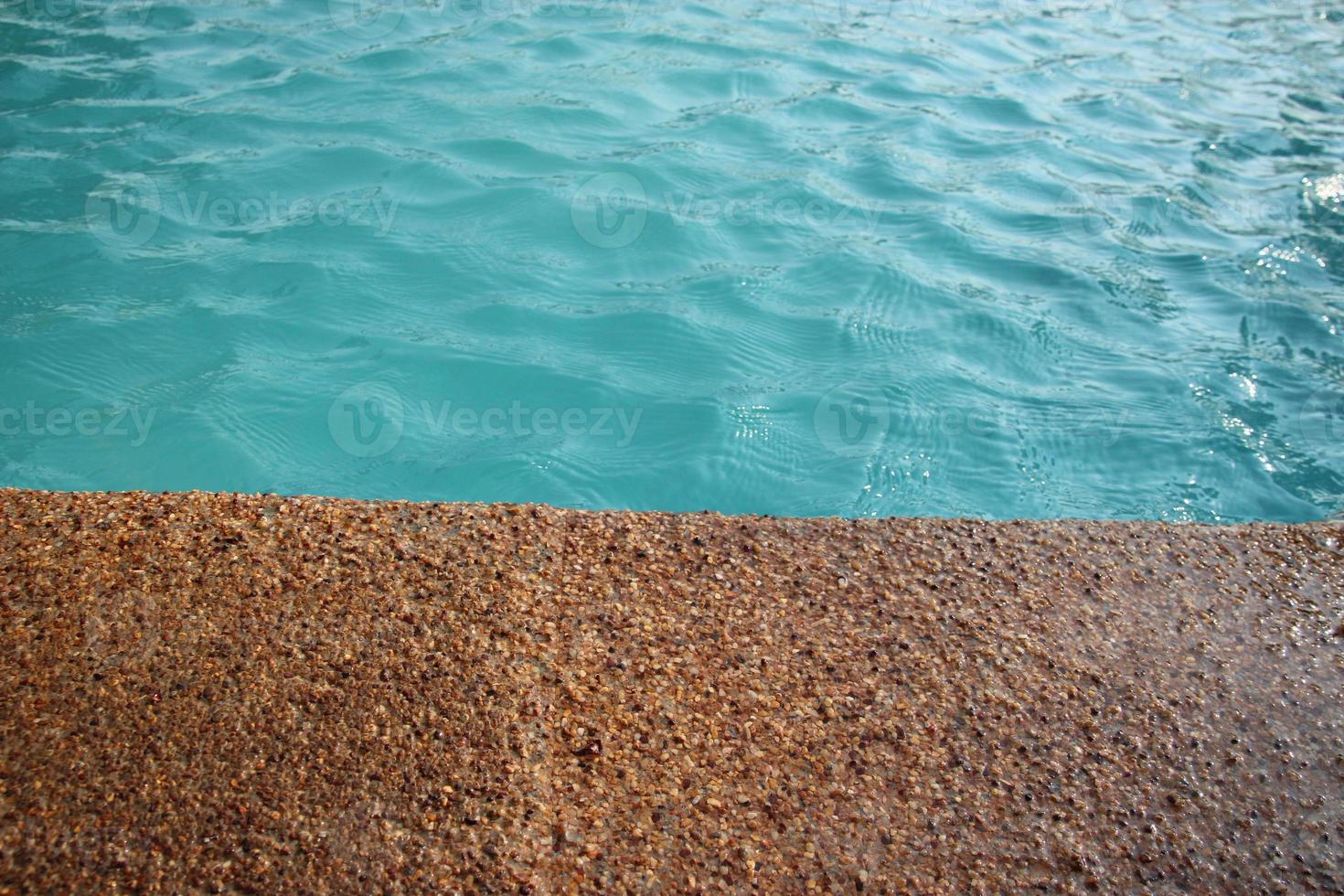 The poolside swimming pool background on daytime photo
