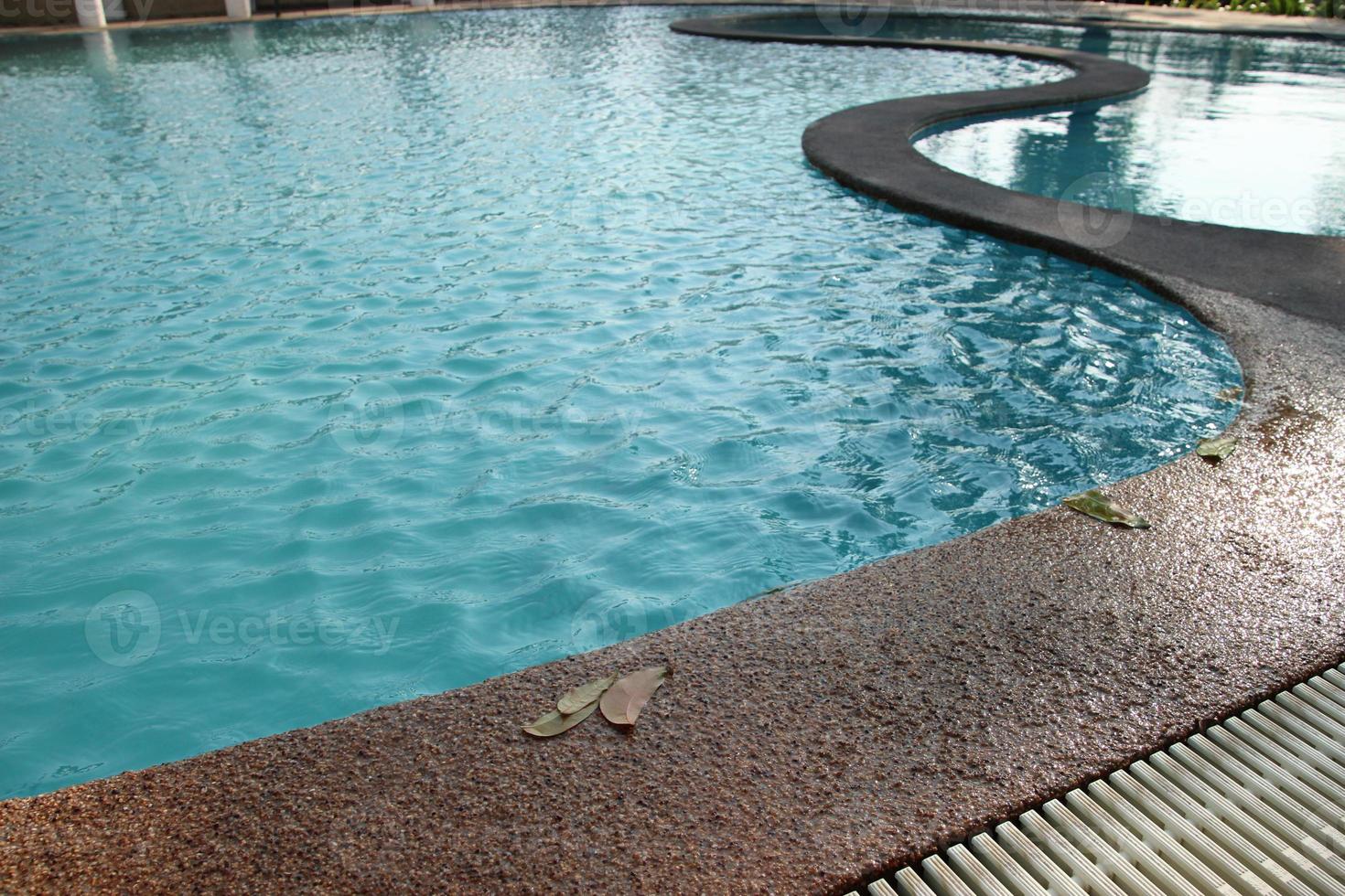 The poolside swimming pool background on daytime photo