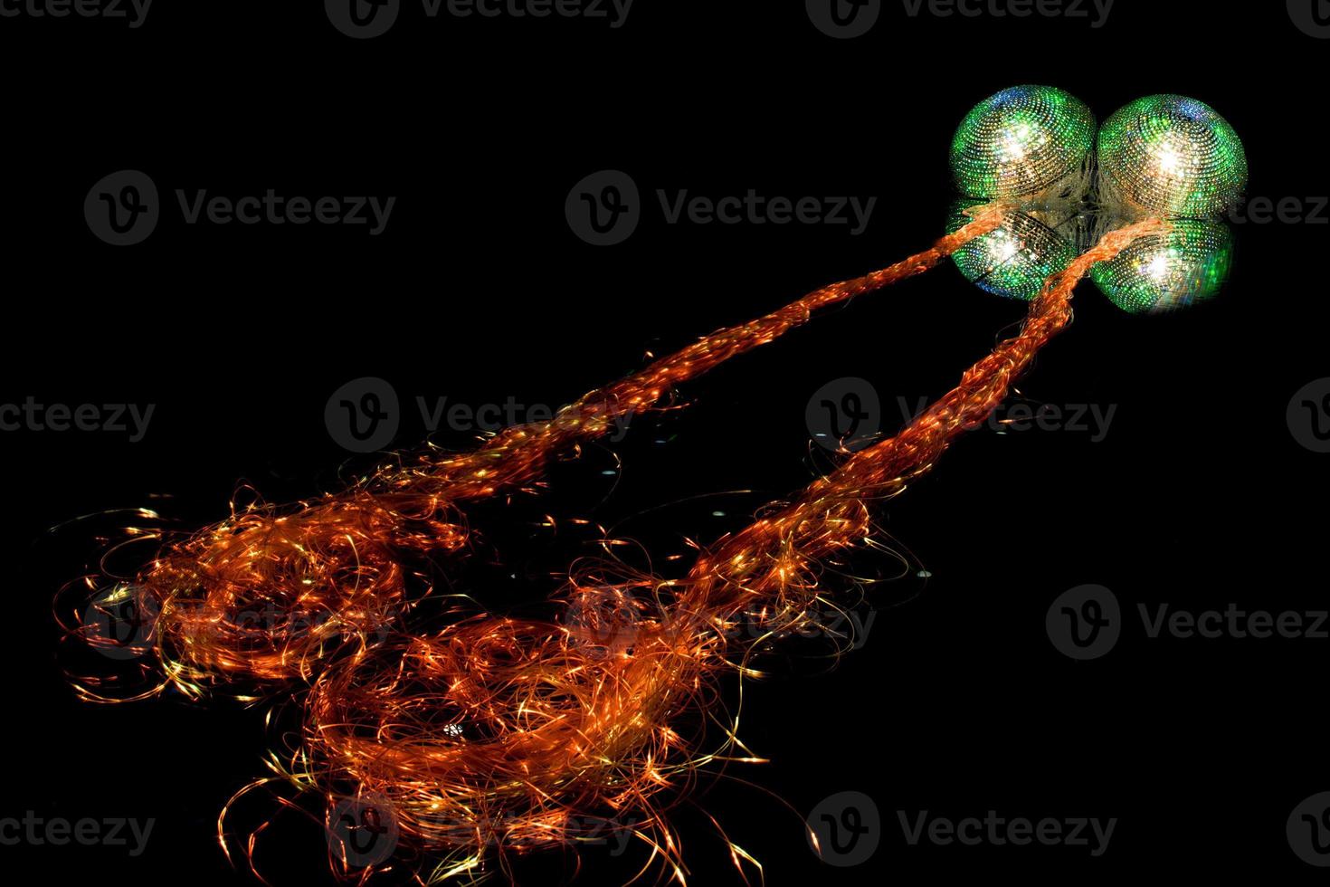 orange electric jellyfish swarovski crystals on black photo