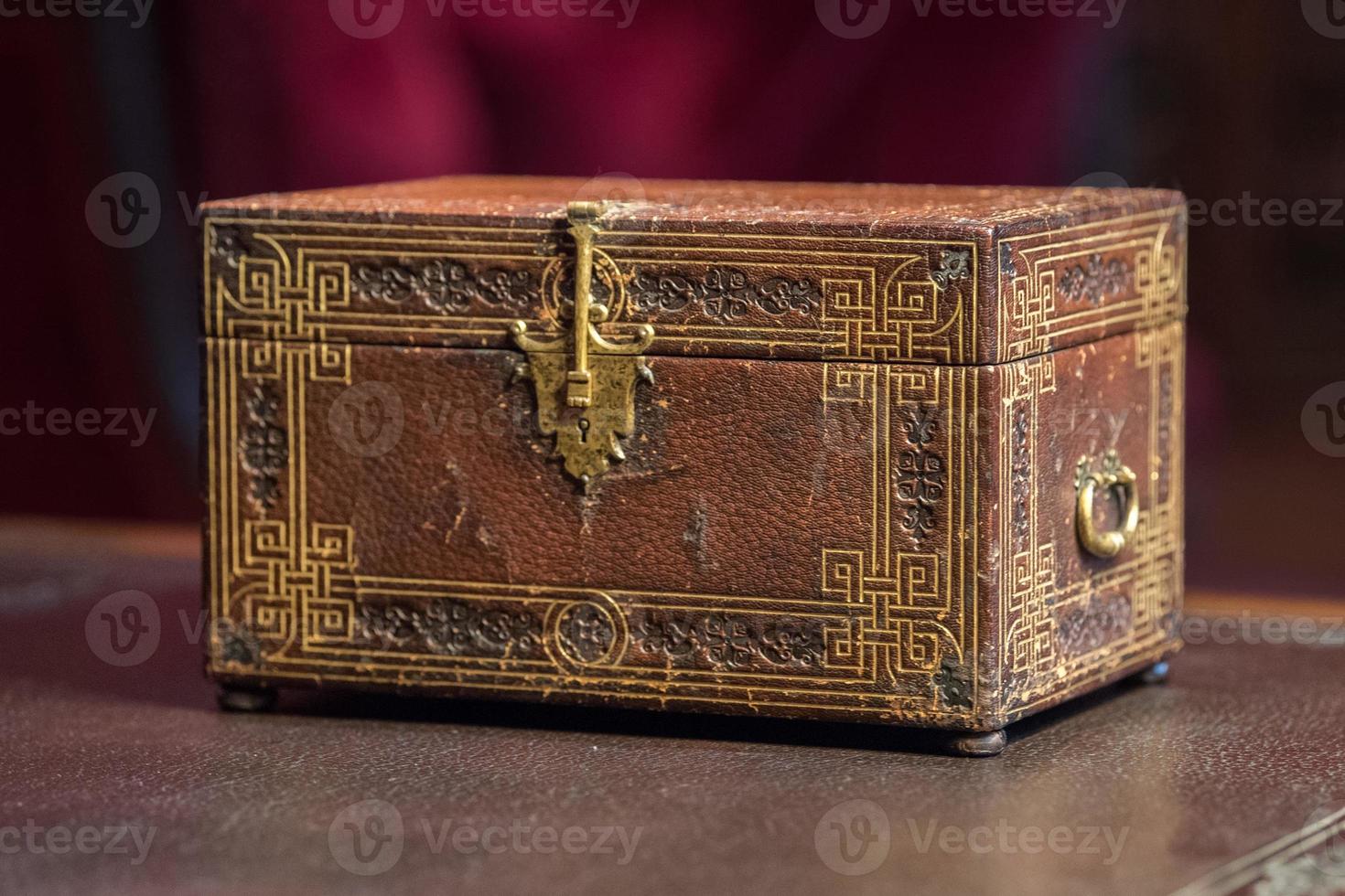 old ancient secret casket on a desk photo