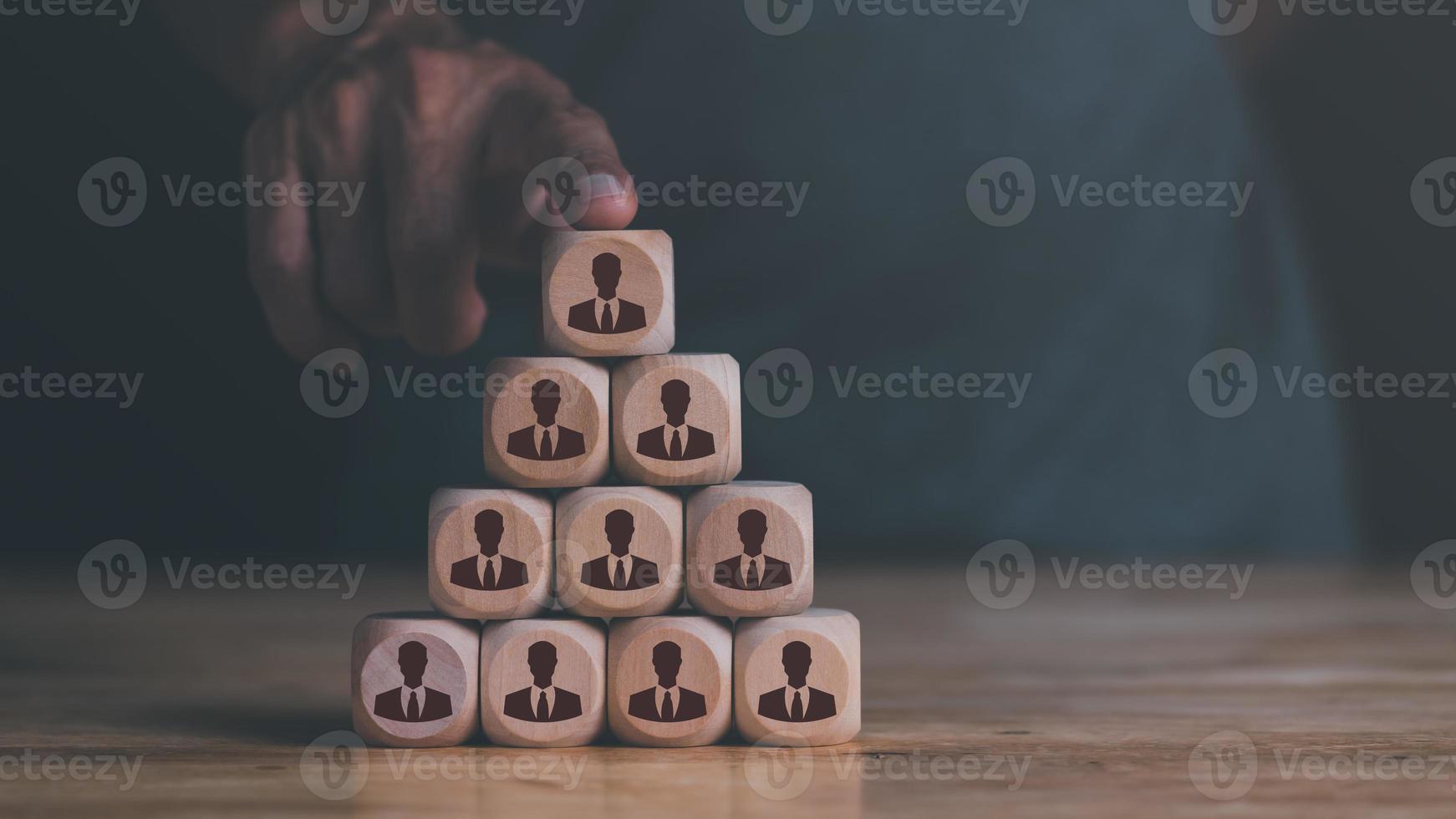 The concept of business development with personnel, Choosing a professional leader, recruitment, job interview, find your career, HRM or Human Resource Management ,wooden blocks on the table photo