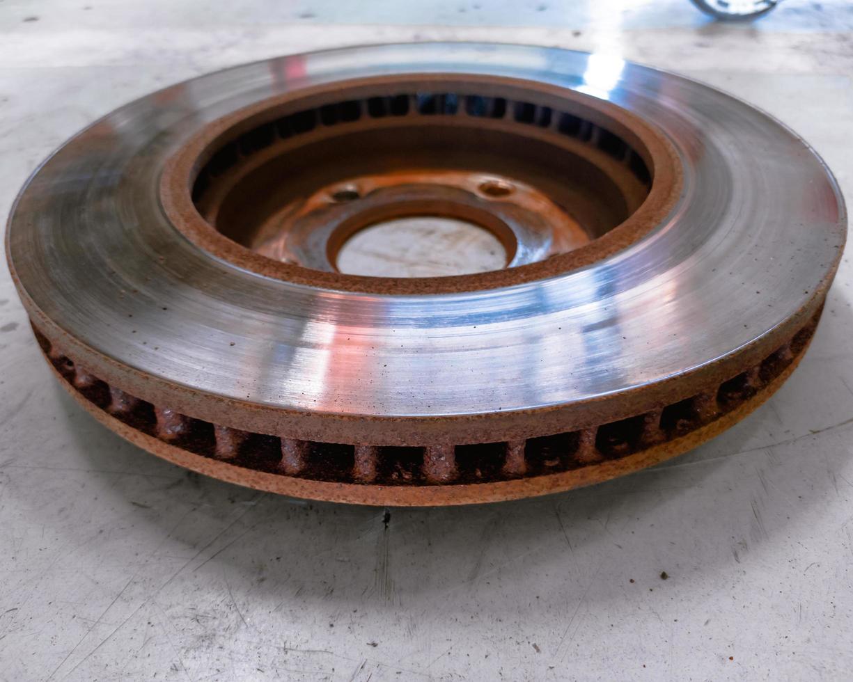 close up photo of car disc brake rotor, car front braking system