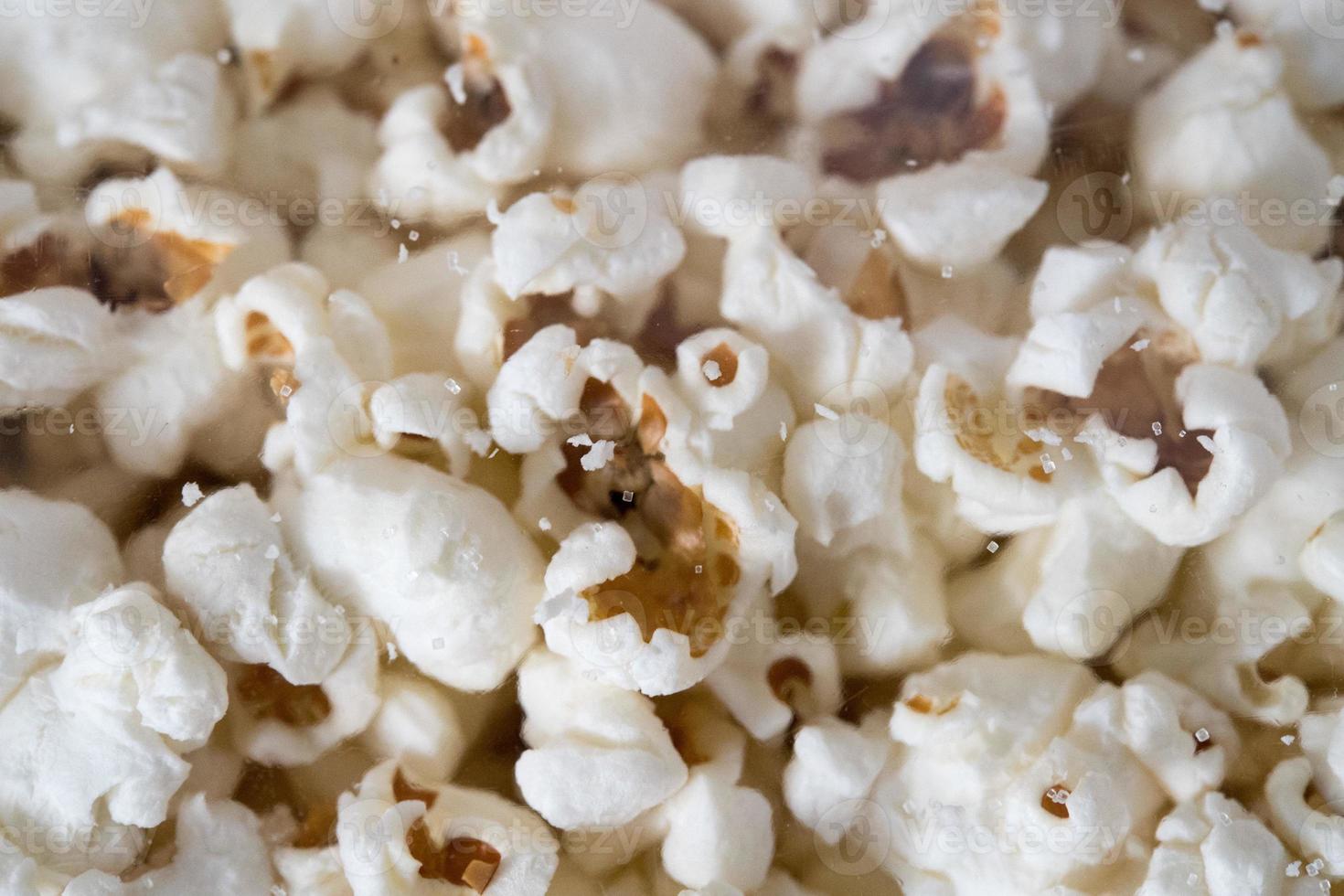 many pop corns background 20217944 Stock Photo at Vecteezy