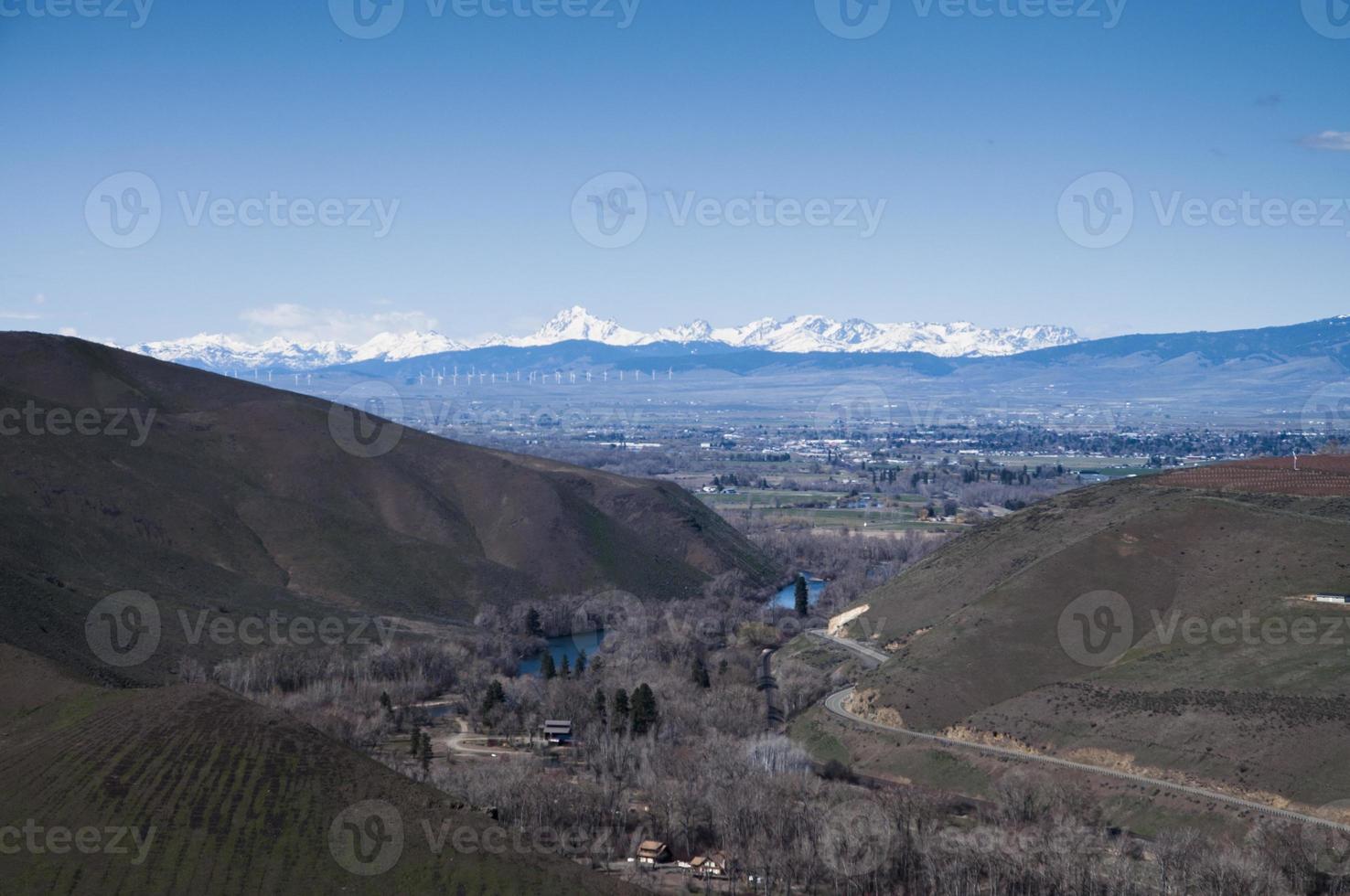 Valley and snow mountains photo