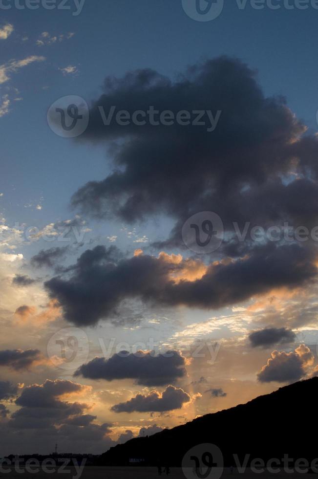 Dramatic clouds at dusk photo