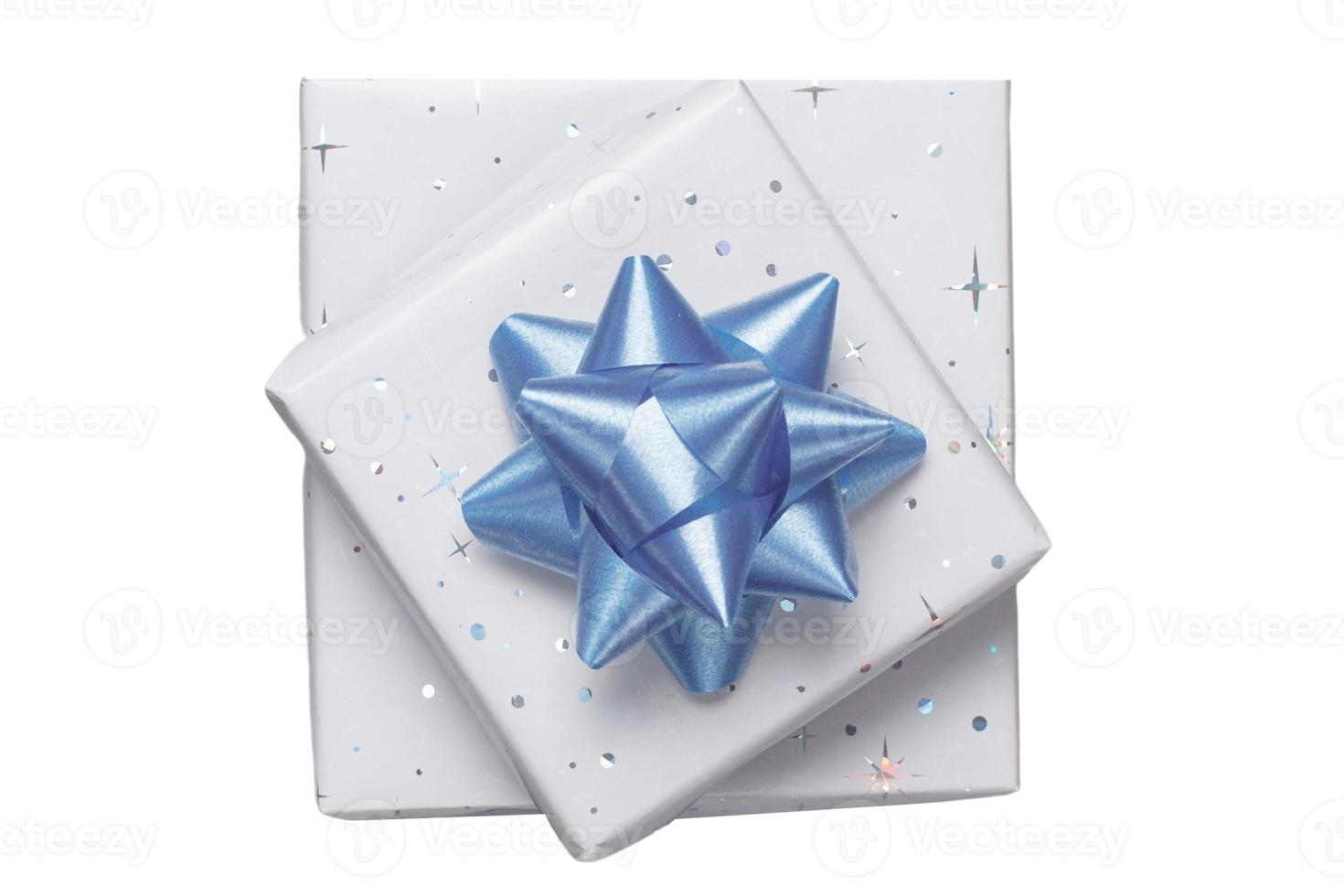 6457 White gift boxes with a blue ribbon isolated on a transparent background photo