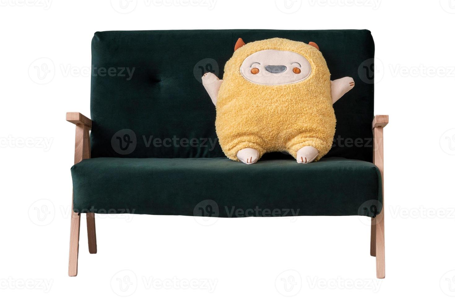 5562 Green sofa with yellow plush toy isolated on a transparent background photo
