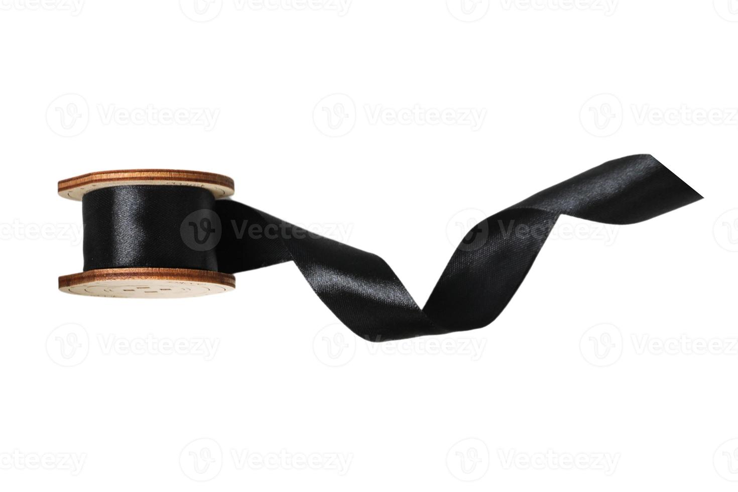6524 Black ribbon reel isolated on a transparent background photo