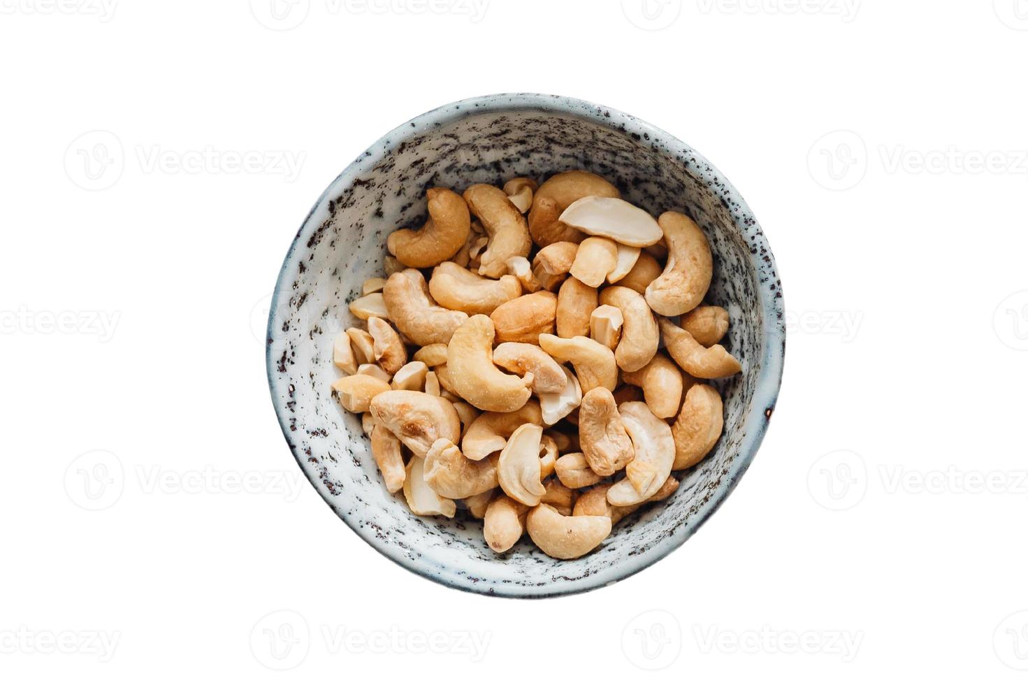 3092 Beige nuts in a bowl isolated on a transparent background photo
