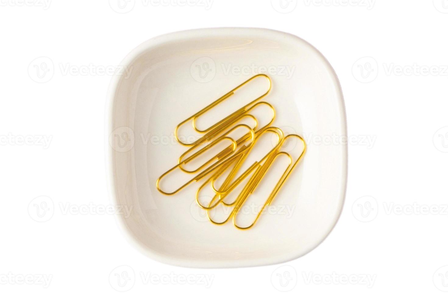 1069 White plate with gold clips isolated on a transparent background photo
