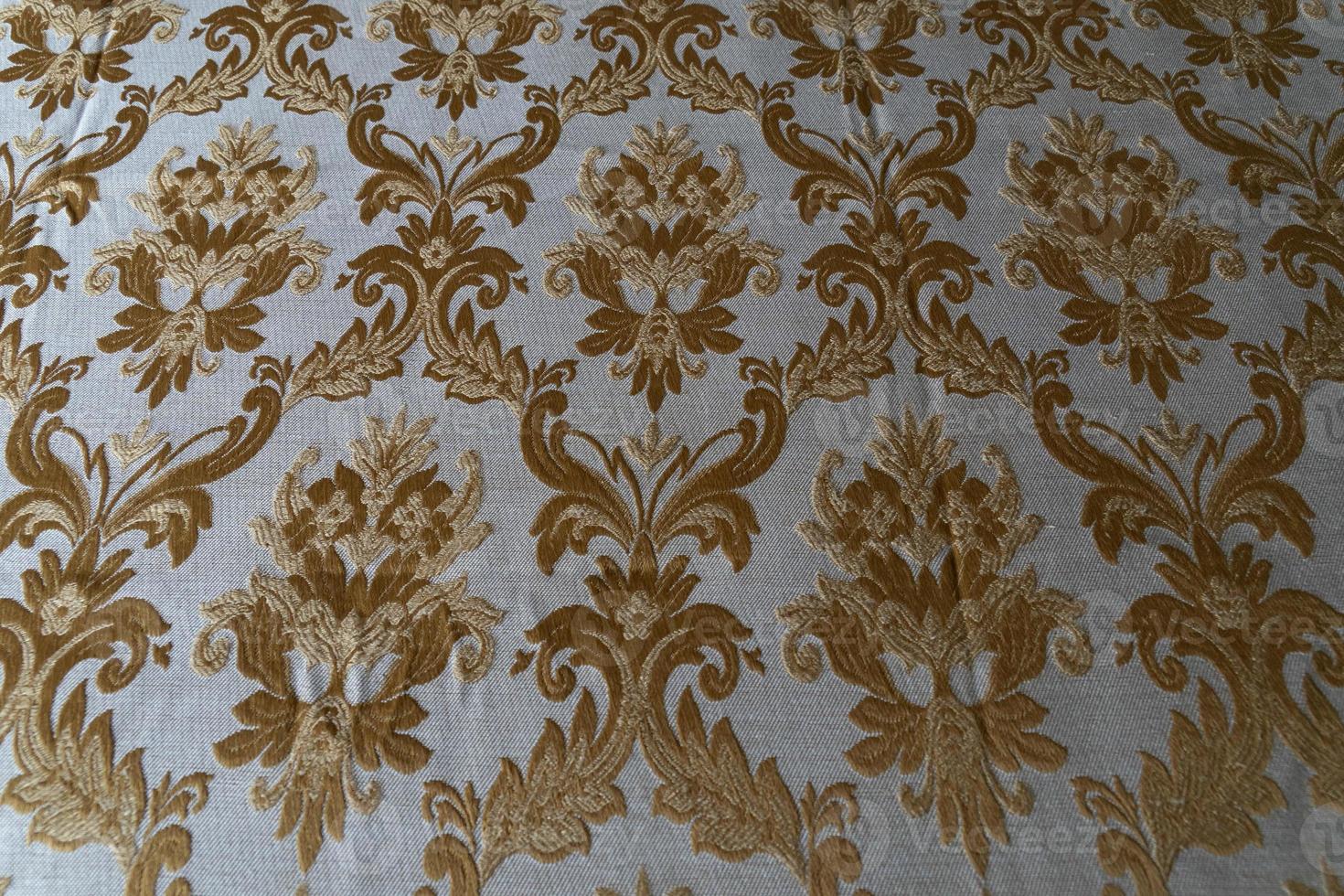 medieval fabric texture background gold and white photo