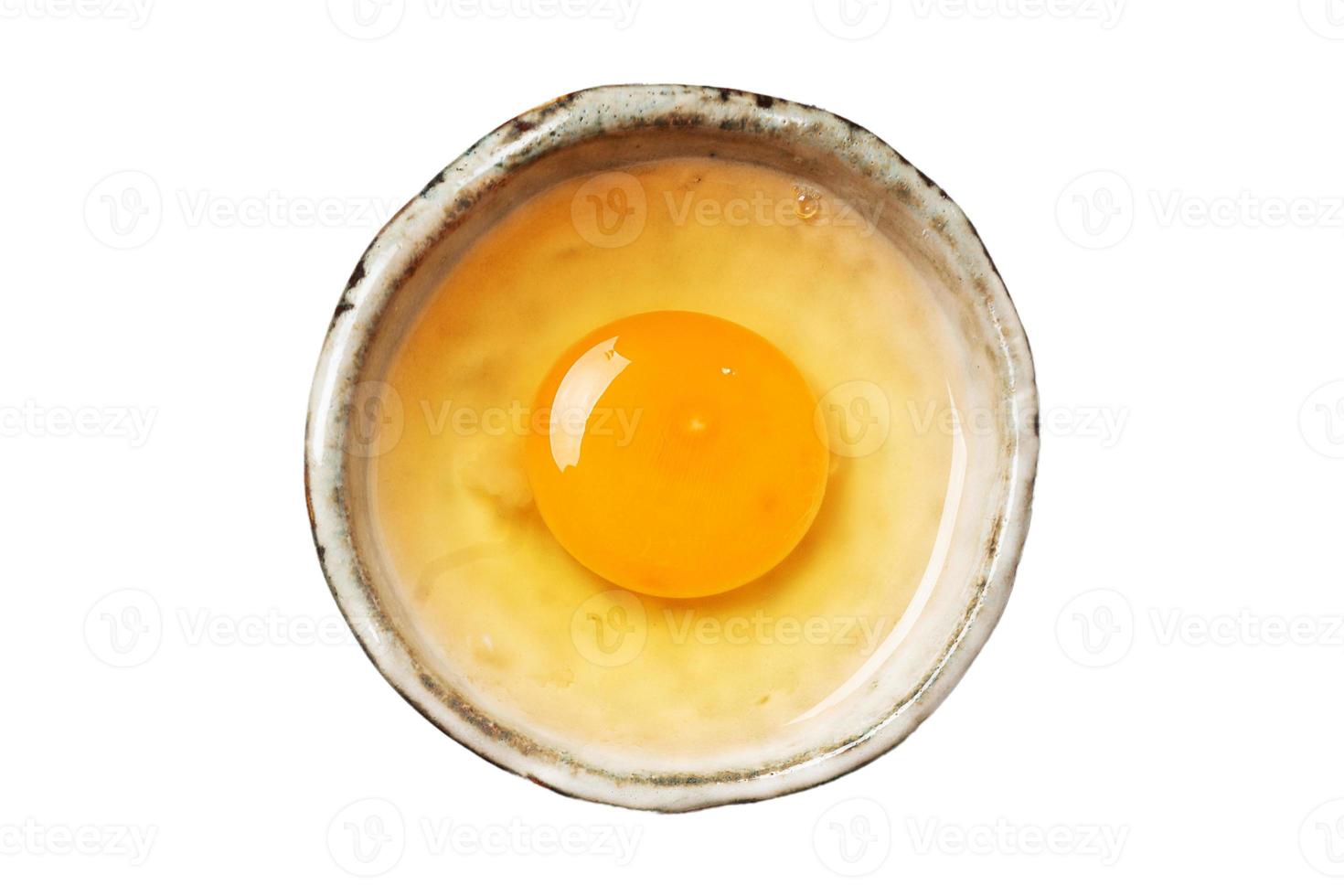 3033 Raw egg in a bowl isolated on a transparent background photo