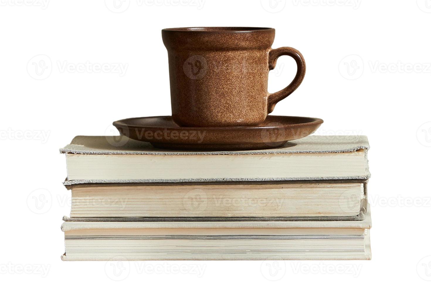 384 Books and brown cup isolated on a transparent background photo