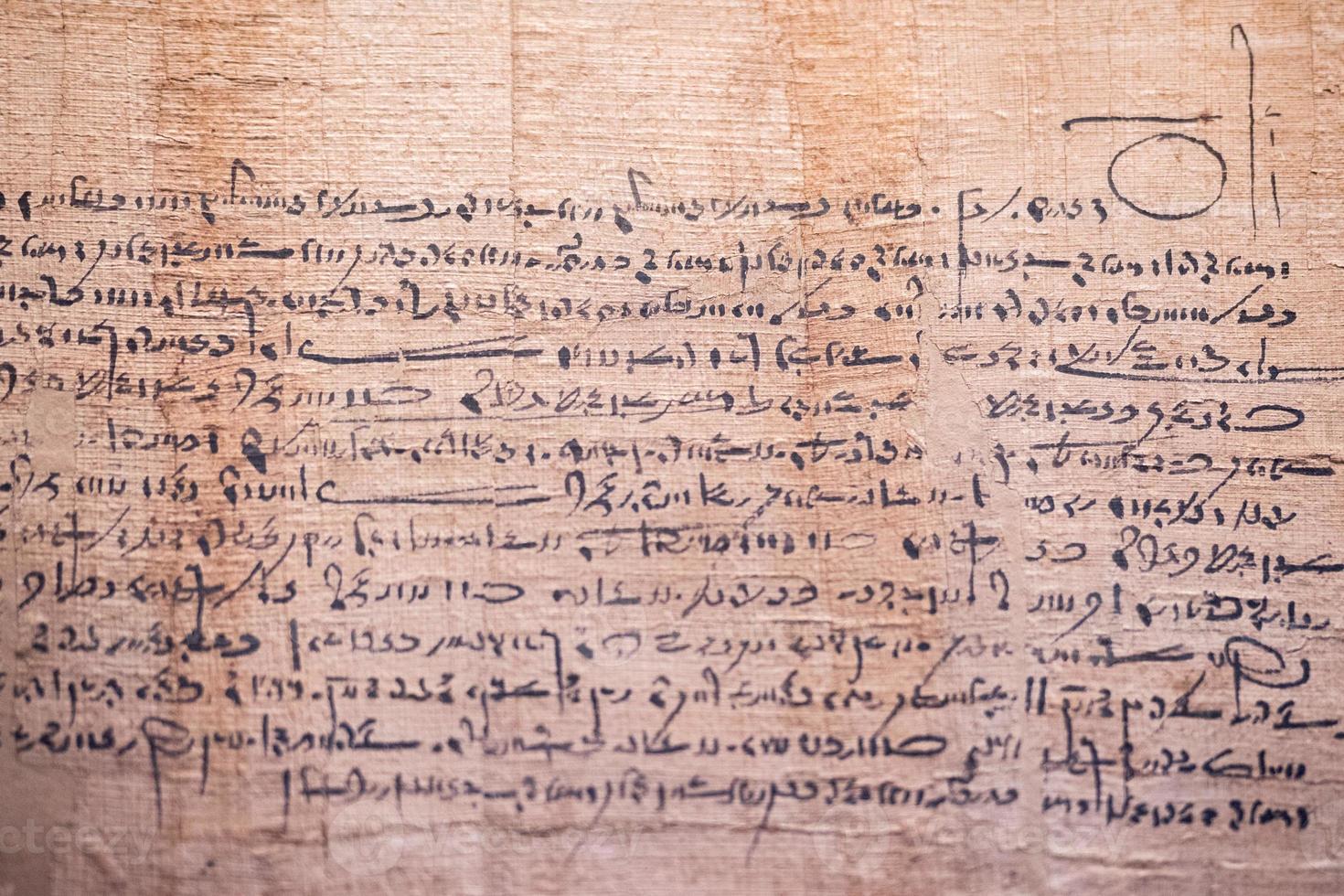 ancient arabic writings on papyrus photo