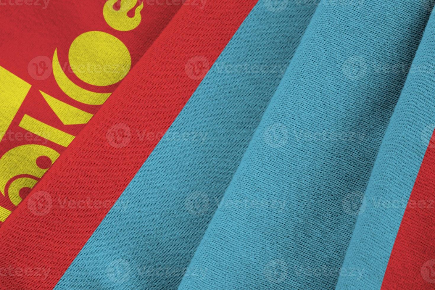 Mongolia flag with big folds waving close up under the studio light indoors. The official symbols and colors in banner photo