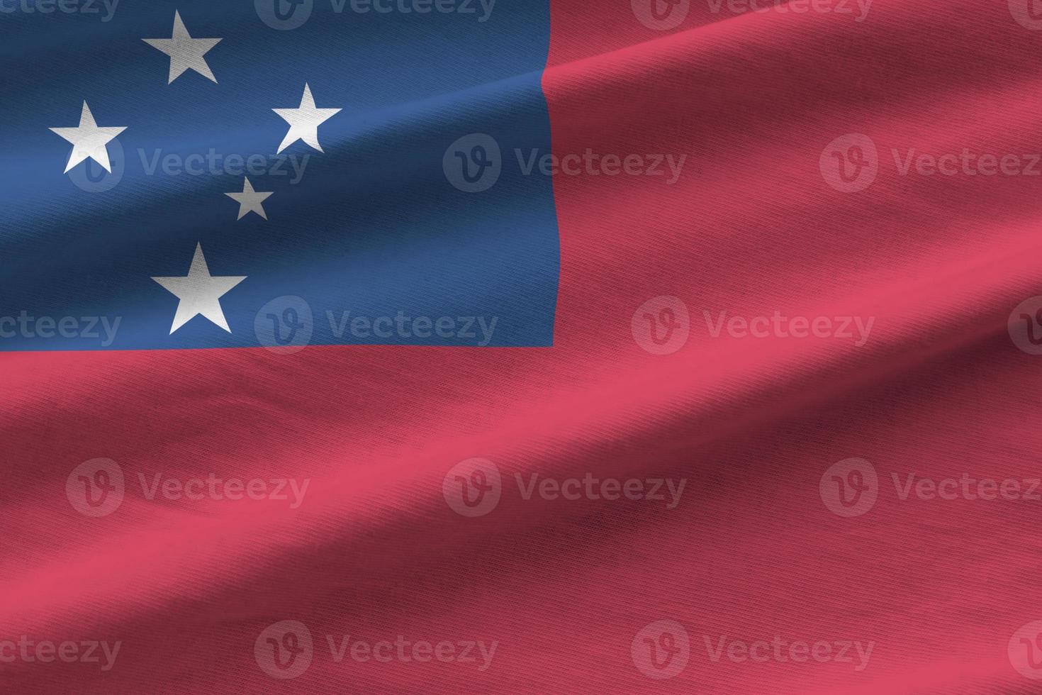 Samoa flag with big folds waving close up under the studio light indoors. The official symbols and colors in banner photo