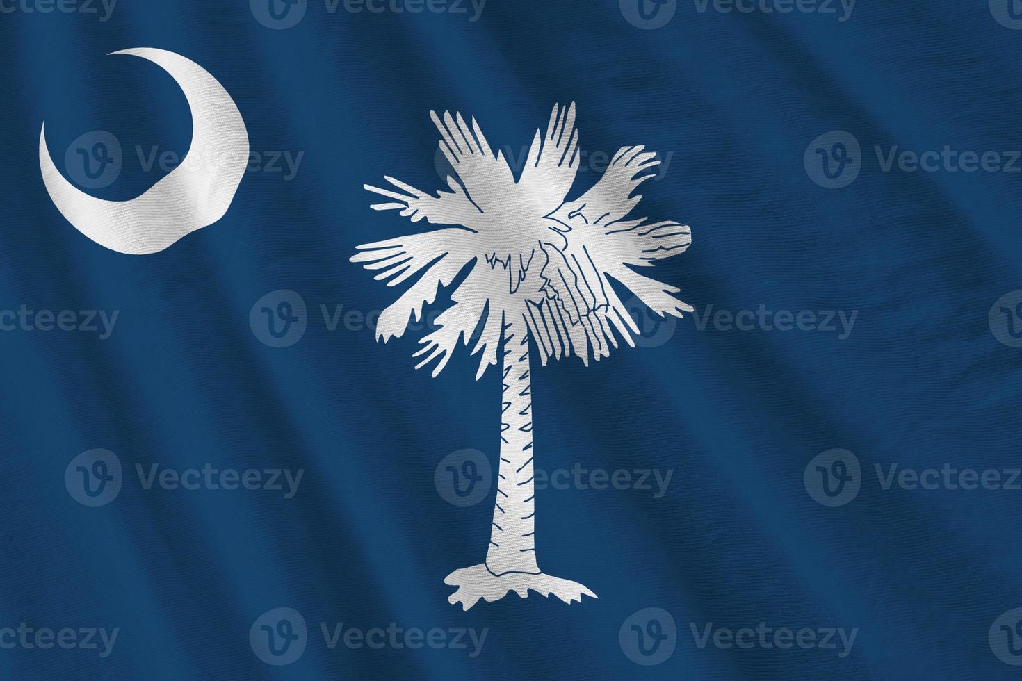 South Carolina US state flag with big folds waving close up under the studio light indoors. The official symbols and colors in banner photo
