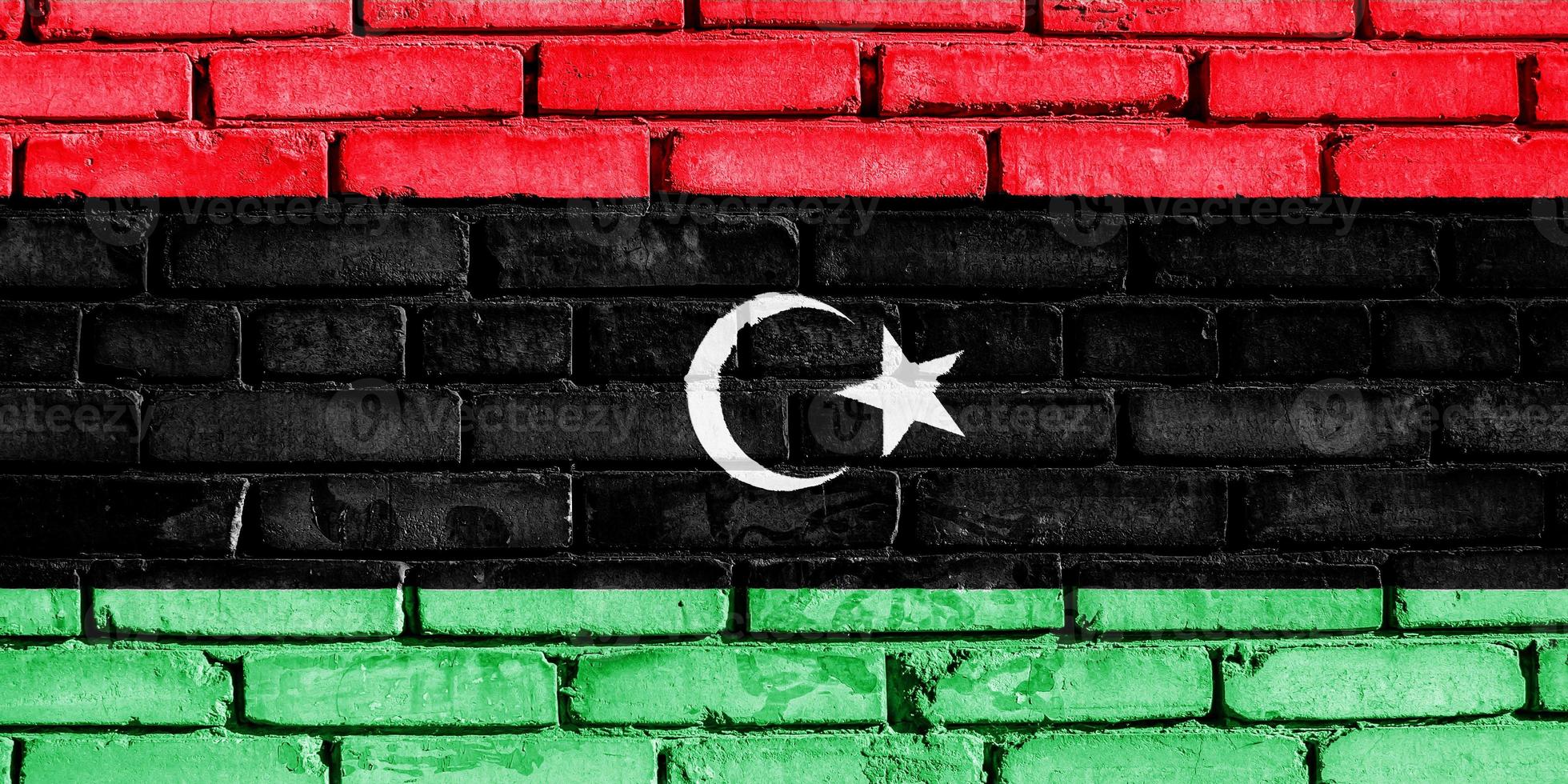 Flag of Libya on a textured background. Concept collage. photo