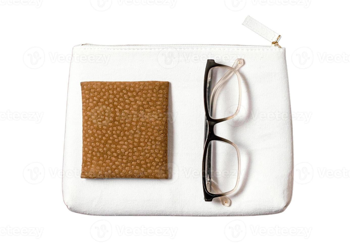 1841 White bag and money wallet and glasses isolated on a transparent background photo