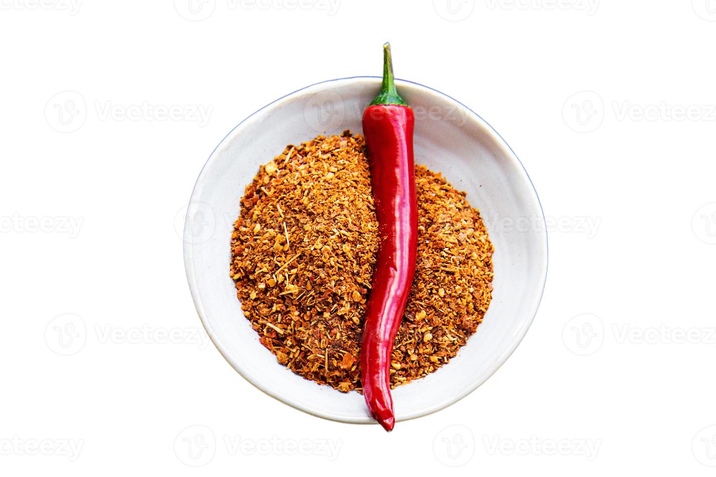 3588 White bowl with spices and red hot chilli isolated on a transparent background photo