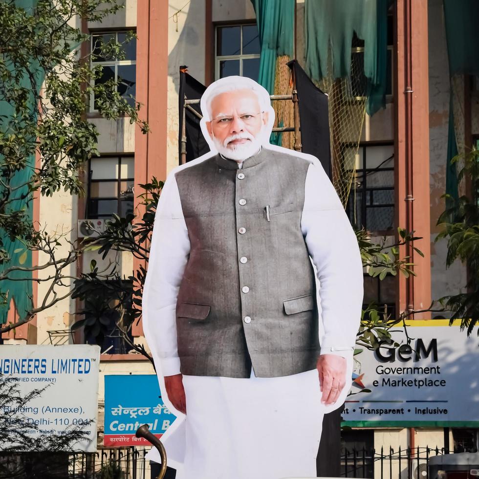 New Delhi, India - January 16 2023 - Prime Minister Narendra Modi cut out during BJP road show, the statue of PM Modi while attending a big election rally in the capital photo