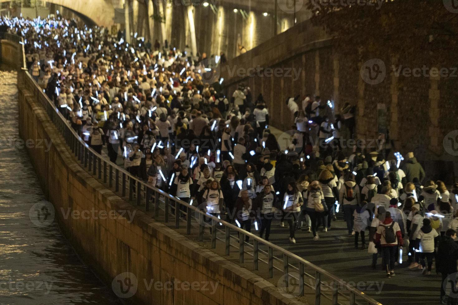 PARIS, FRANCE - NOVEMBER 20 2021 - Many people marching against women violence photo