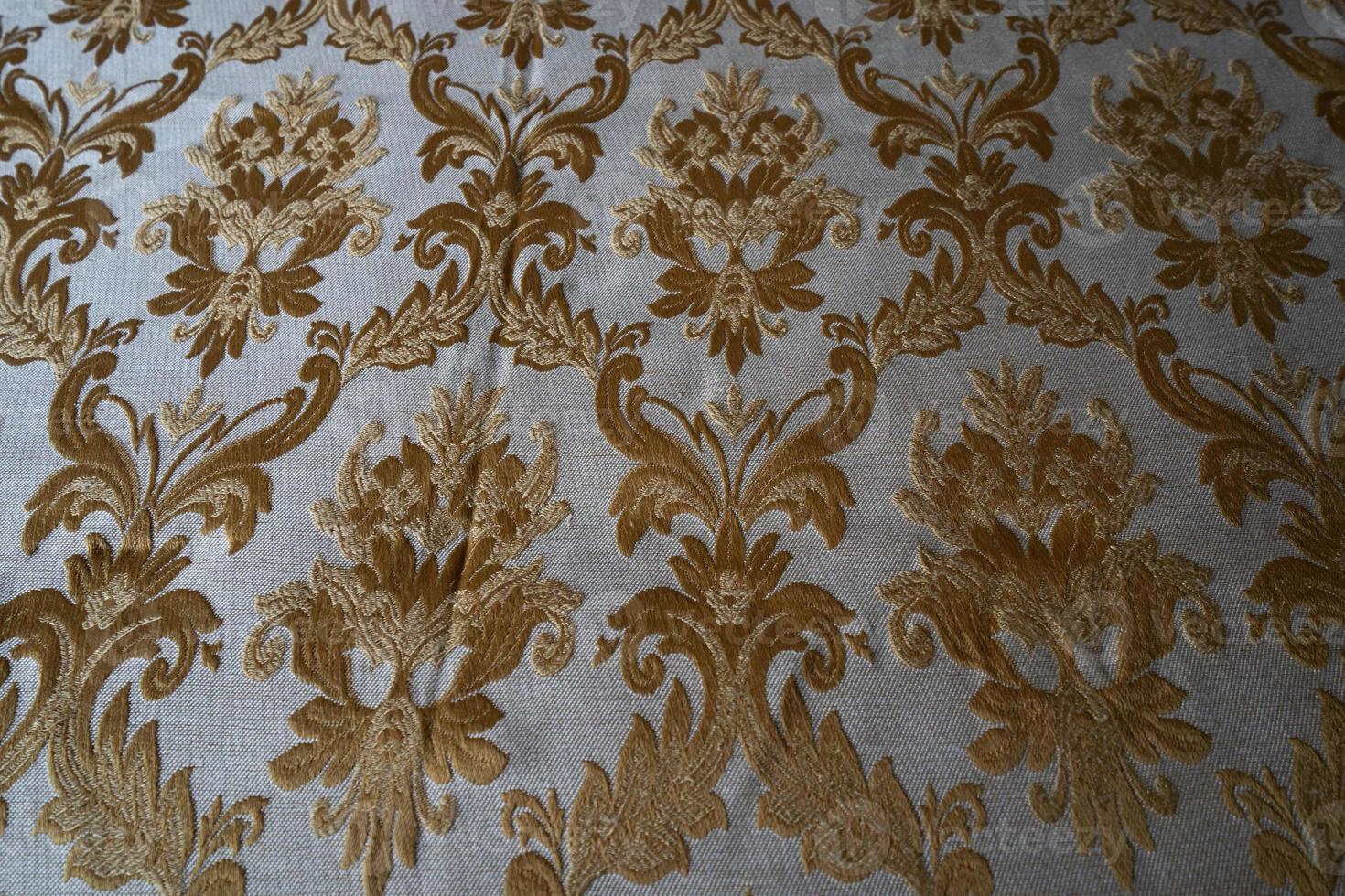 medieval fabric texture background gold and white photo