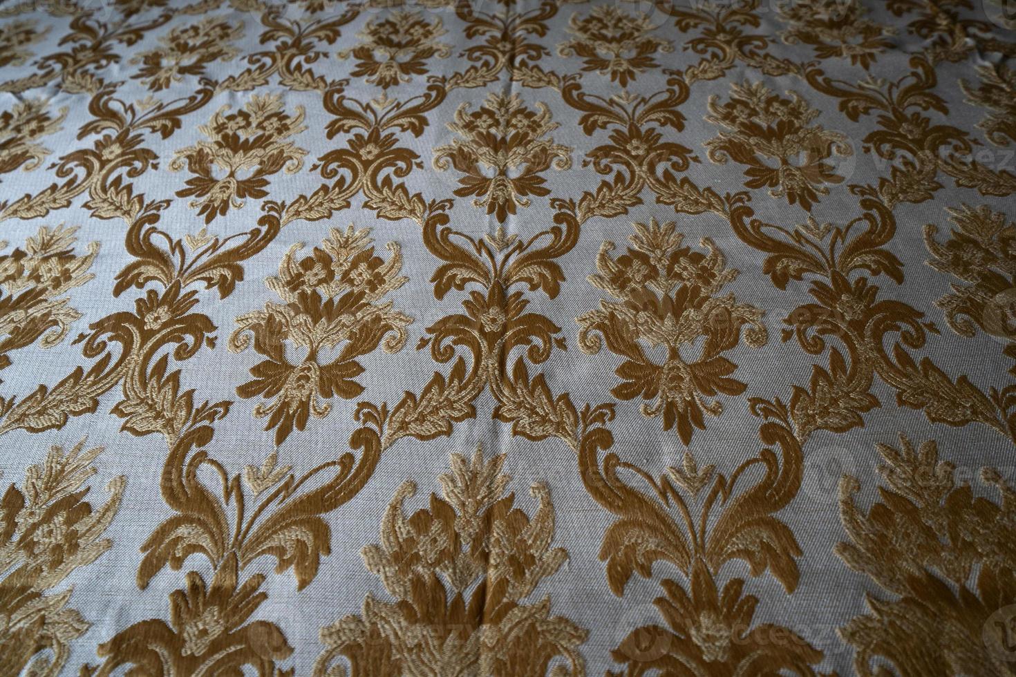 medieval fabric texture background gold and white photo