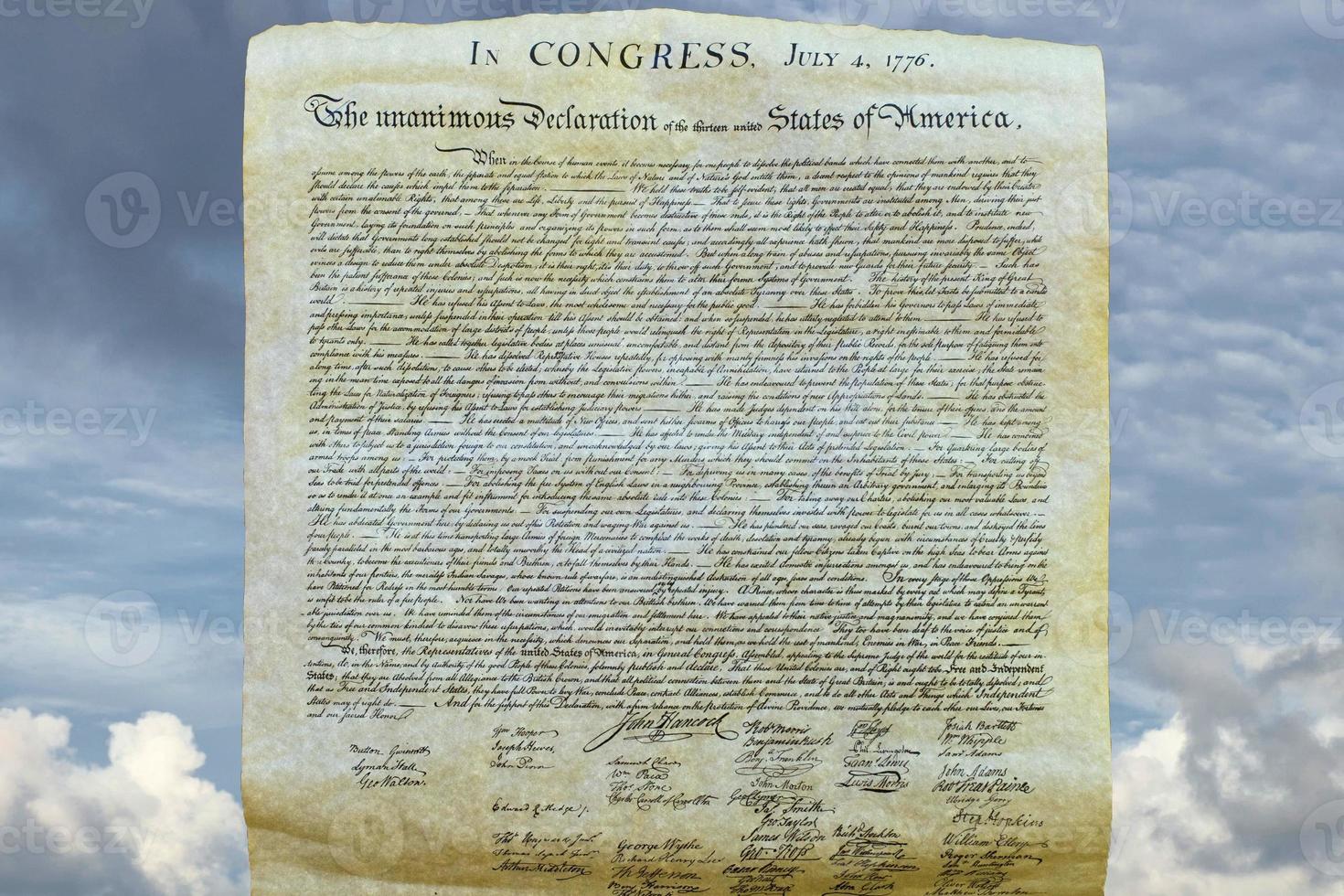 Declaration of independence 4th july 1776 on sky background photo