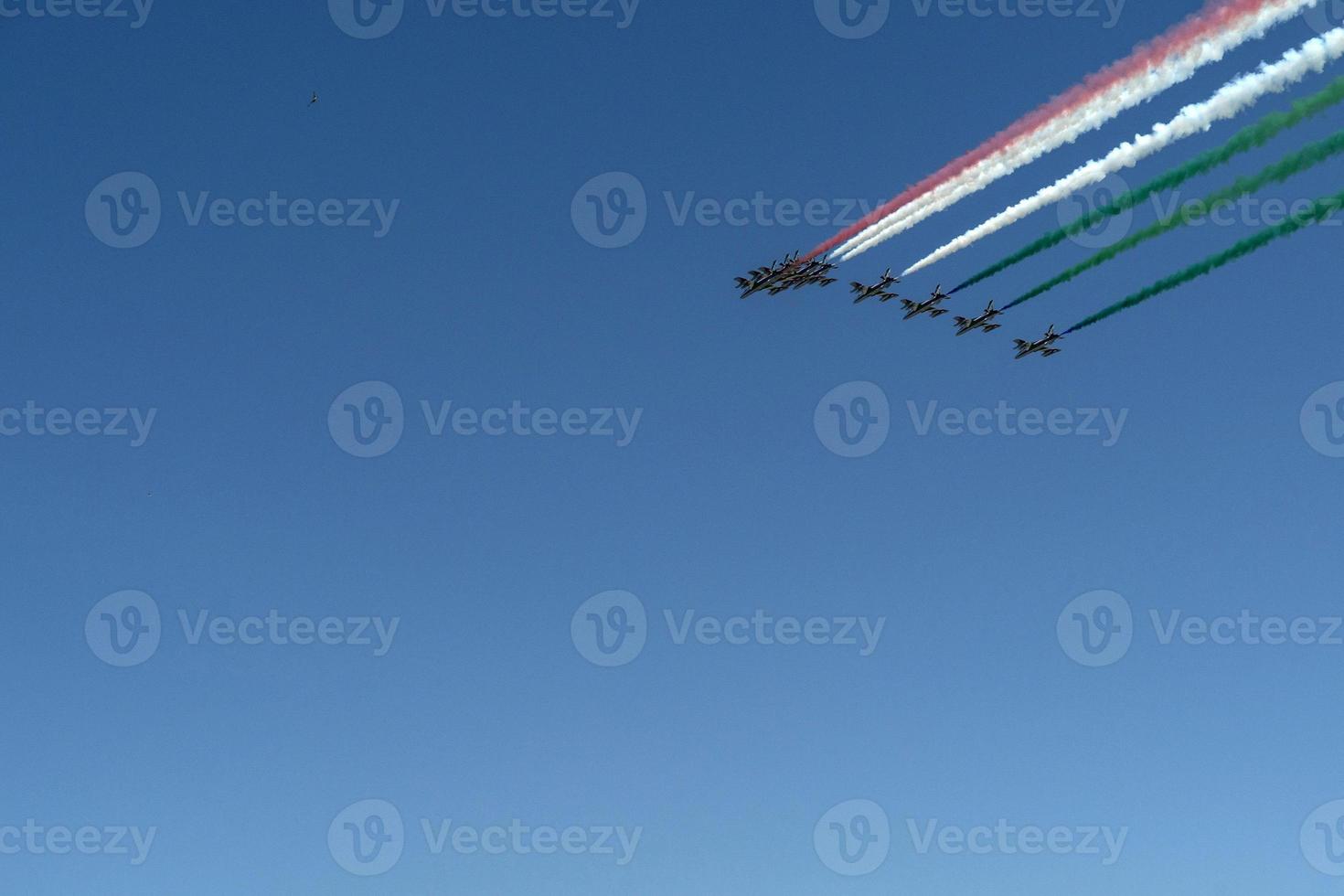Frecce Tricolori Italy acrobatic flight team italian flag red white and green smoke photo