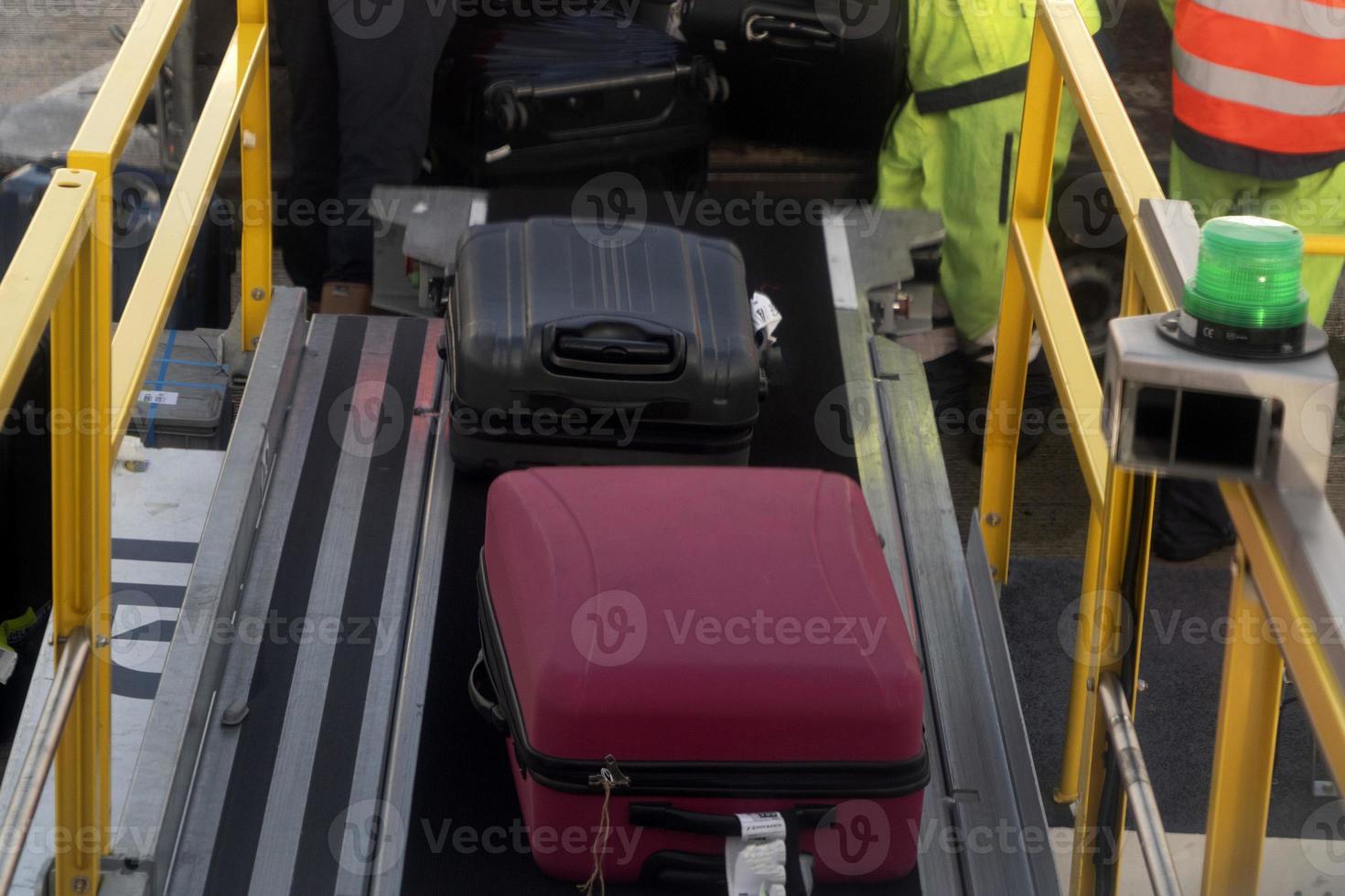 luggage loading on airplane photo