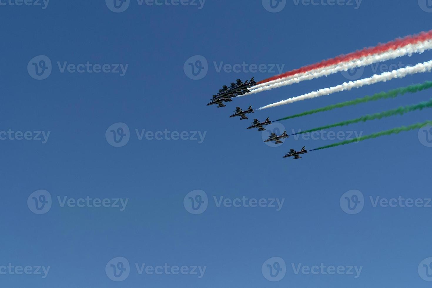Frecce Tricolori Italy acrobatic flight team italian flag red white and green smoke photo
