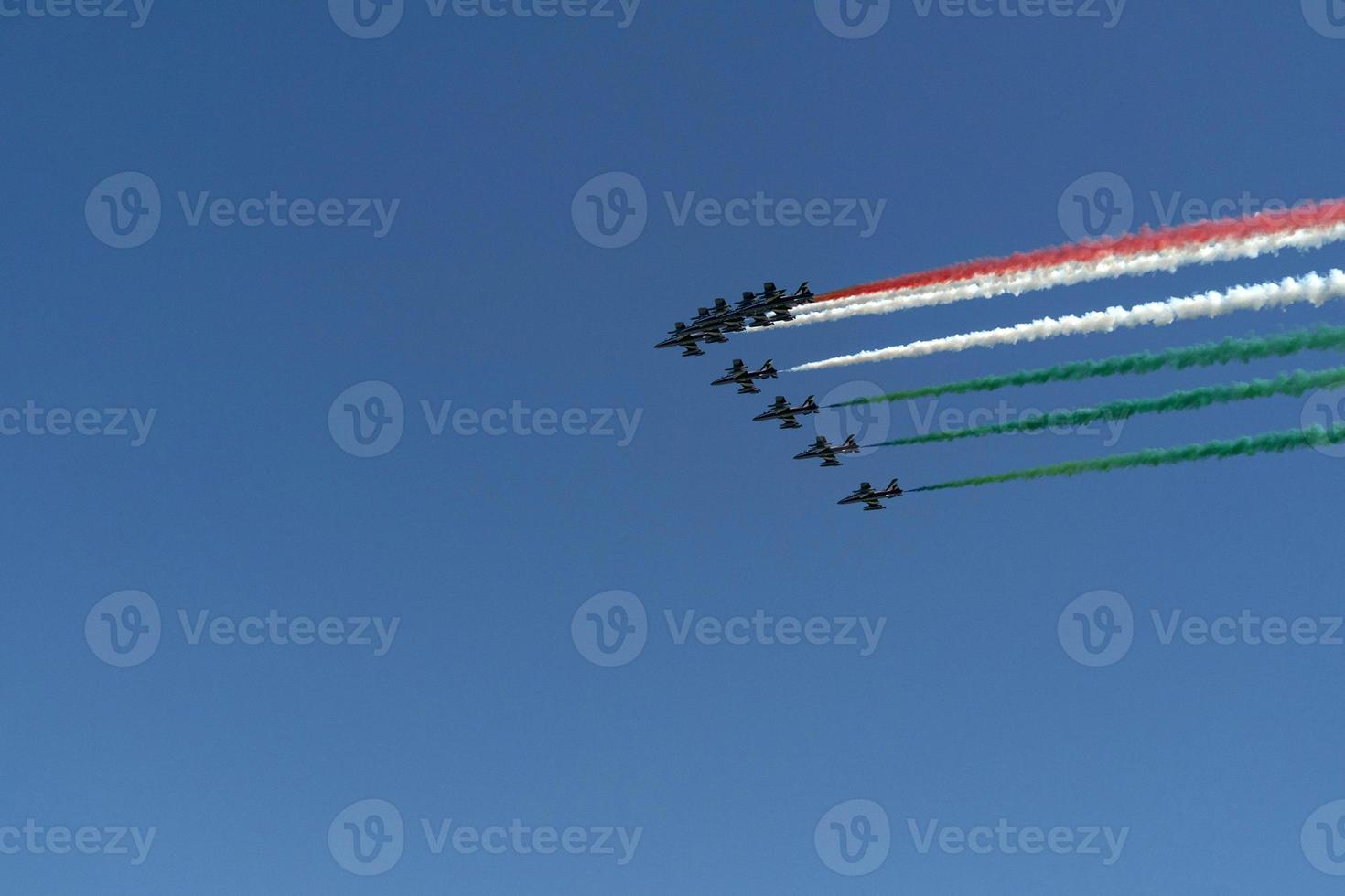 Frecce Tricolori Italy acrobatic flight team italian flag red white and green smoke photo