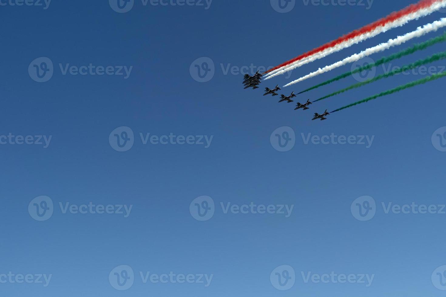 Frecce Tricolori Italy acrobatic flight team italian flag red white and green smoke photo