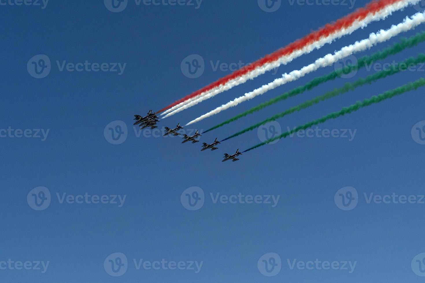 Frecce Tricolori Italy acrobatic flight team italian flag red white and green smoke photo