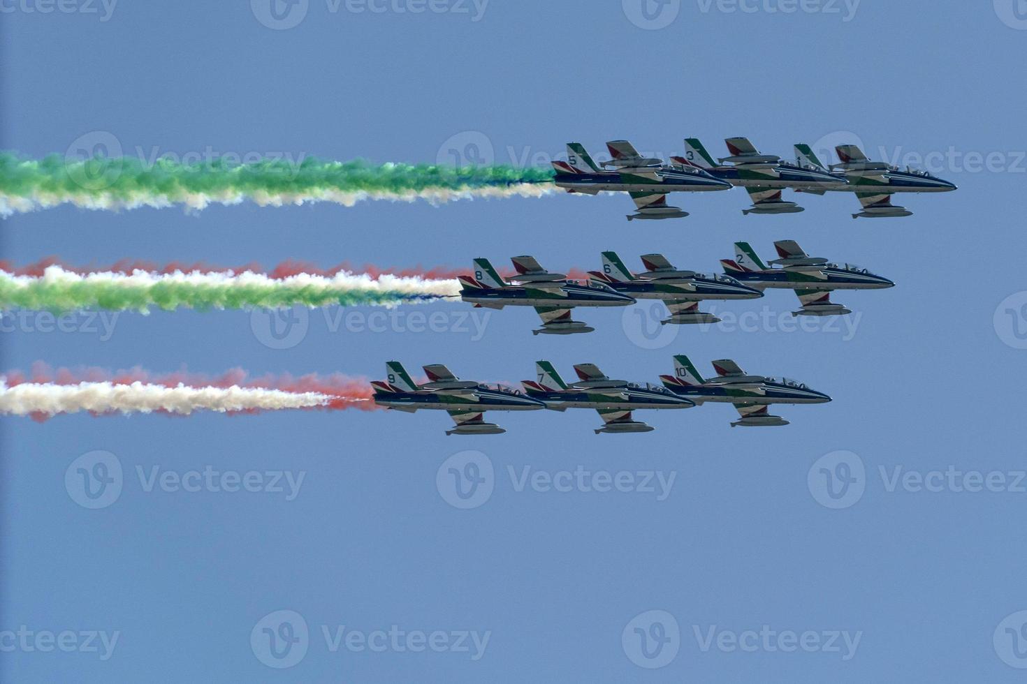 Frecce Tricolori Italy acrobatic flight team italian flag red white and green smoke photo