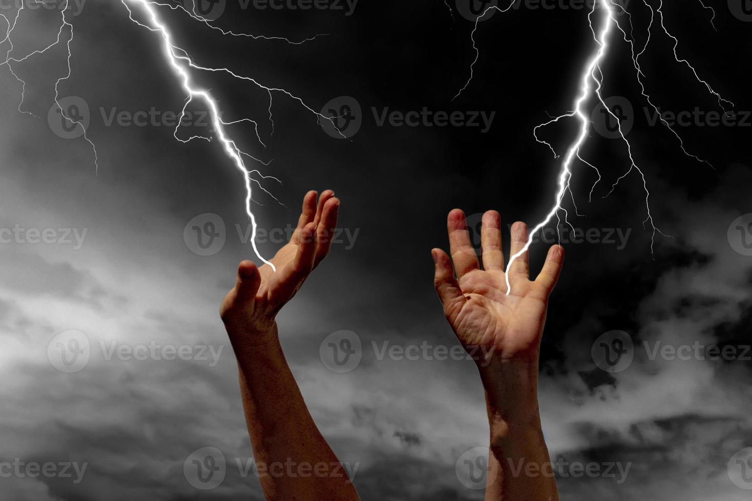 hands of black Migrant detail on boat asking for help from the sea background photo