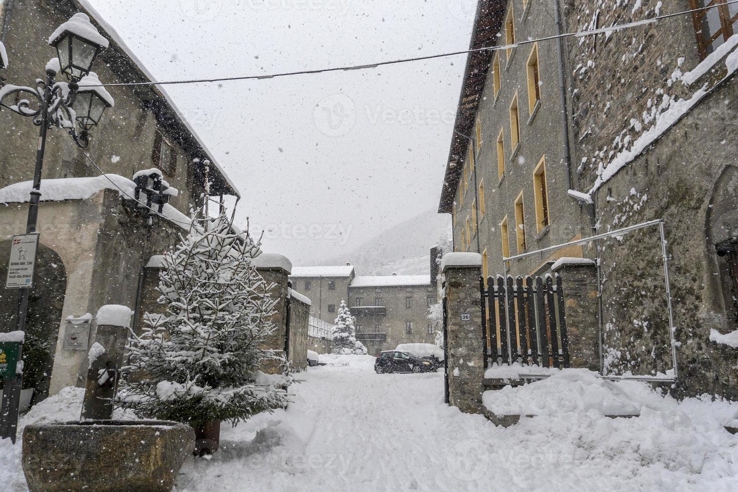 Bormio Medieval village Valtellina Italy under the snow in winter photo