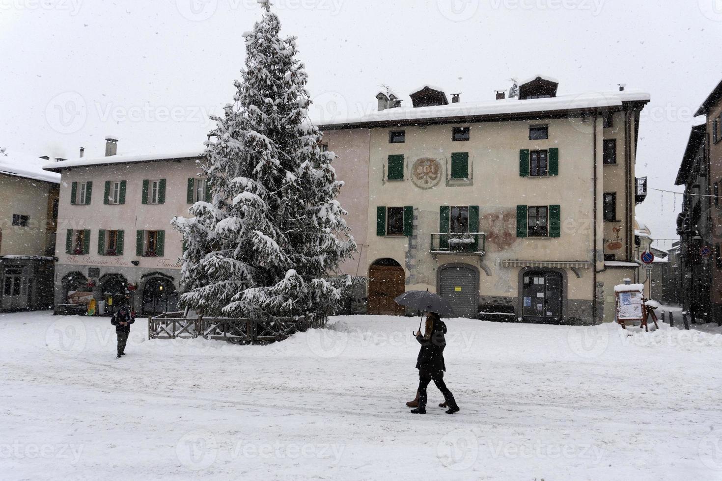 Bormio Medieval village Valtellina Italy under the snow in winter photo