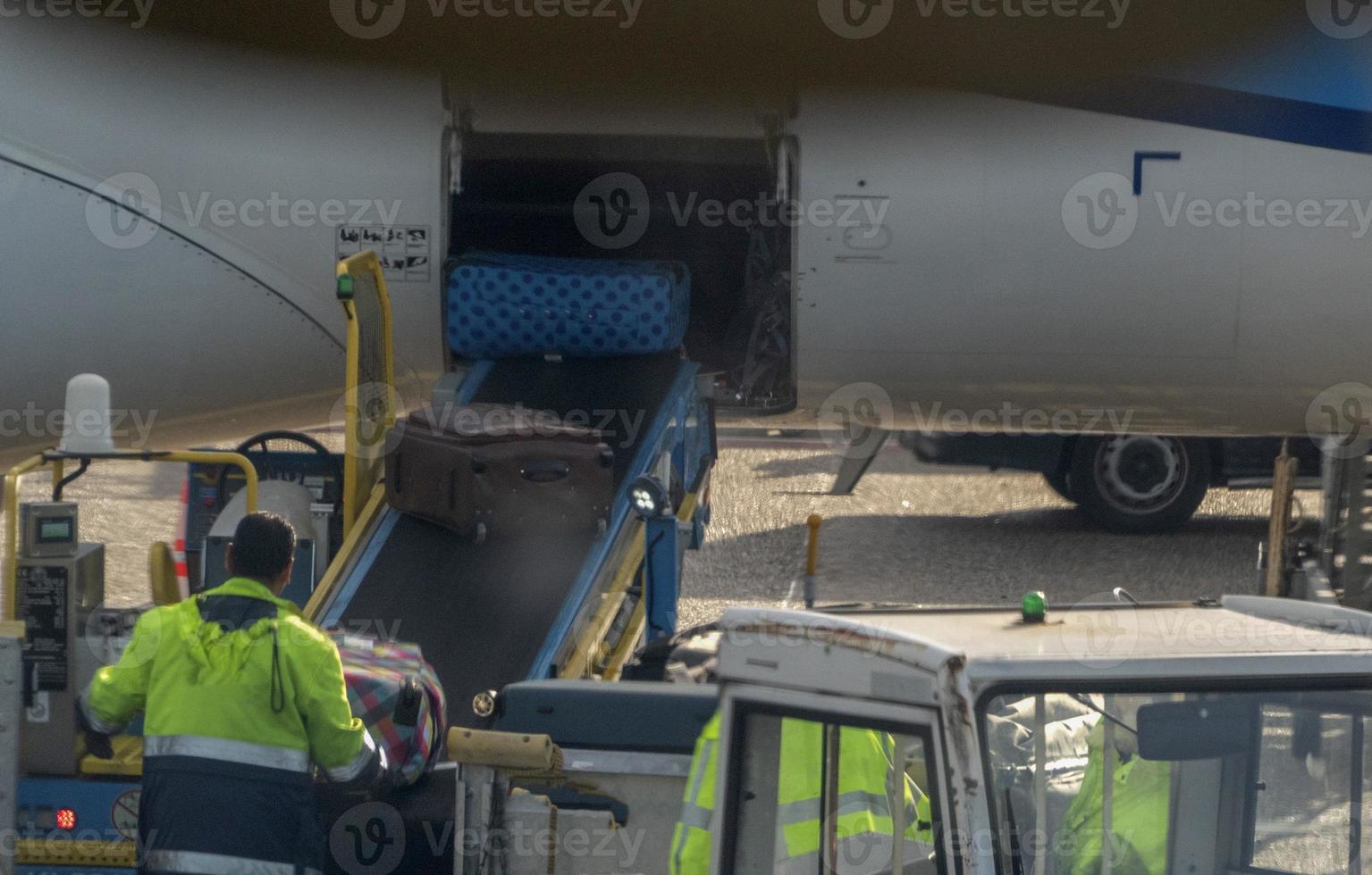 luggage loading on airplane photo