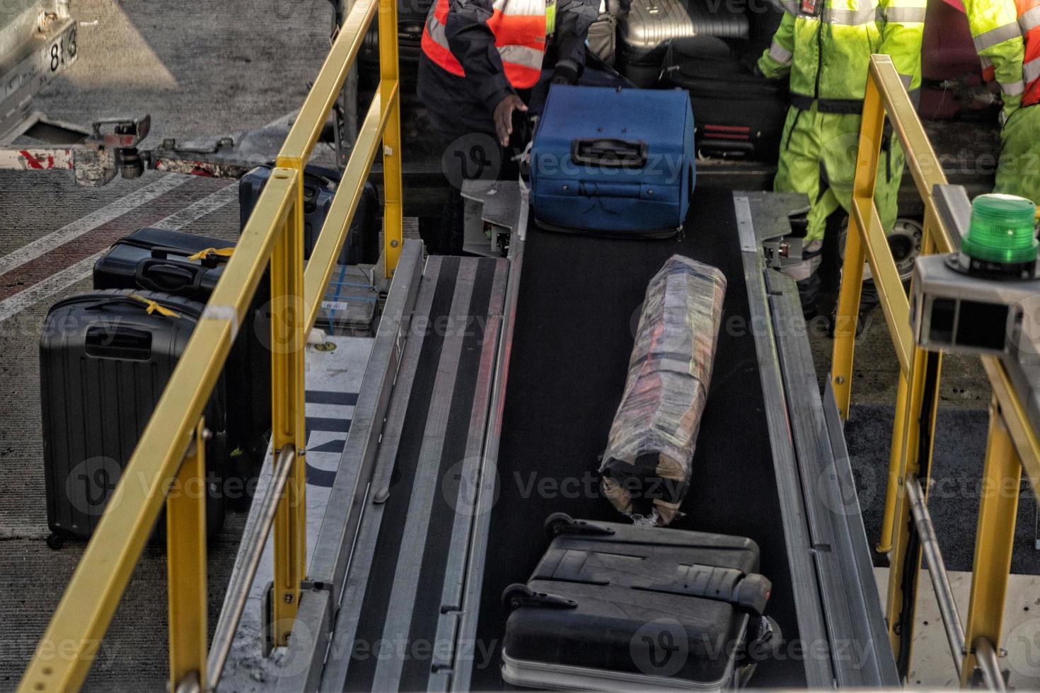 luggage loading on airplane photo