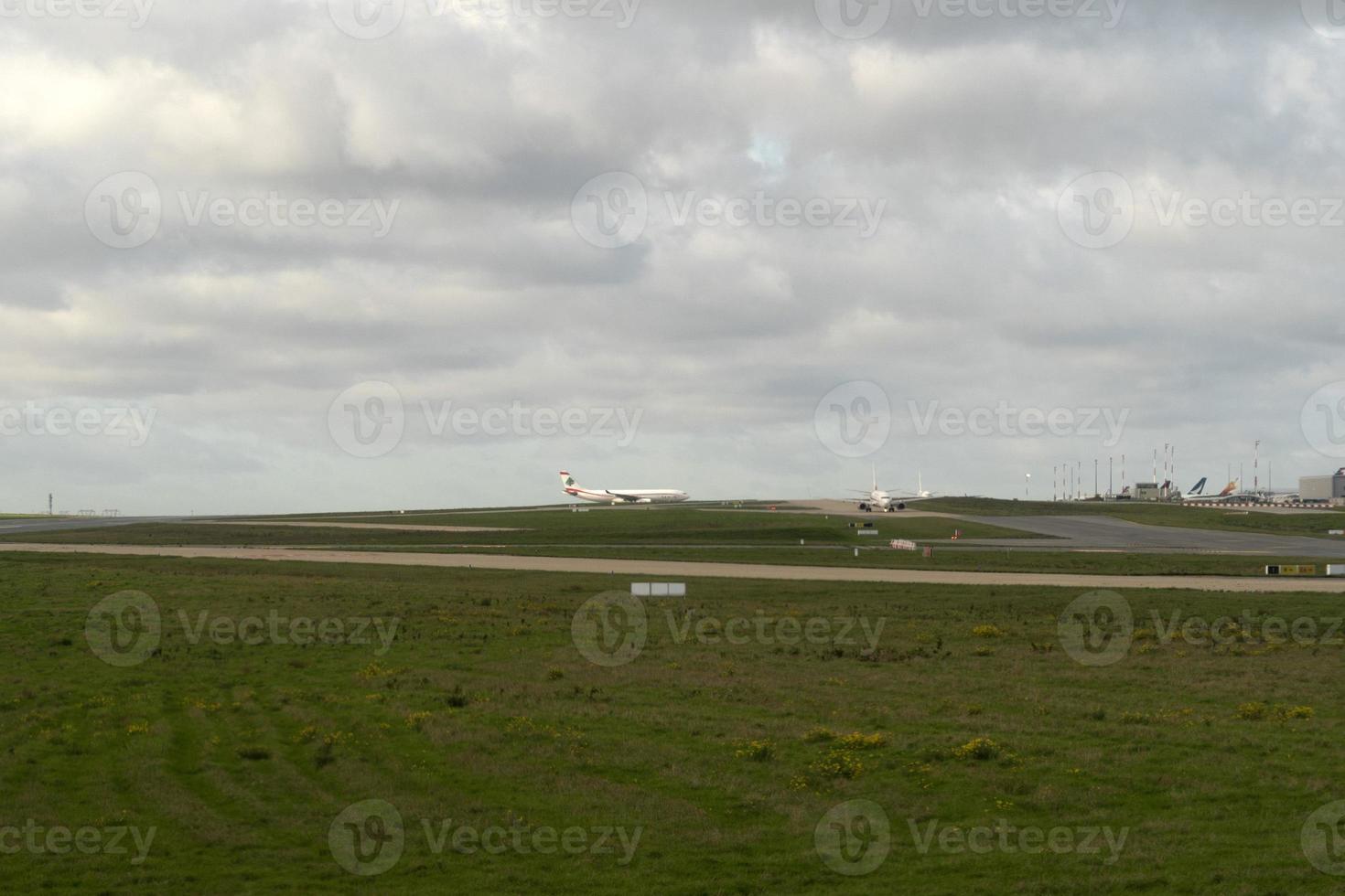 PARIS, FRANCE - NOVEMBER 7 2019 - Paris airport CDG landing and loading cargo and passenger photo