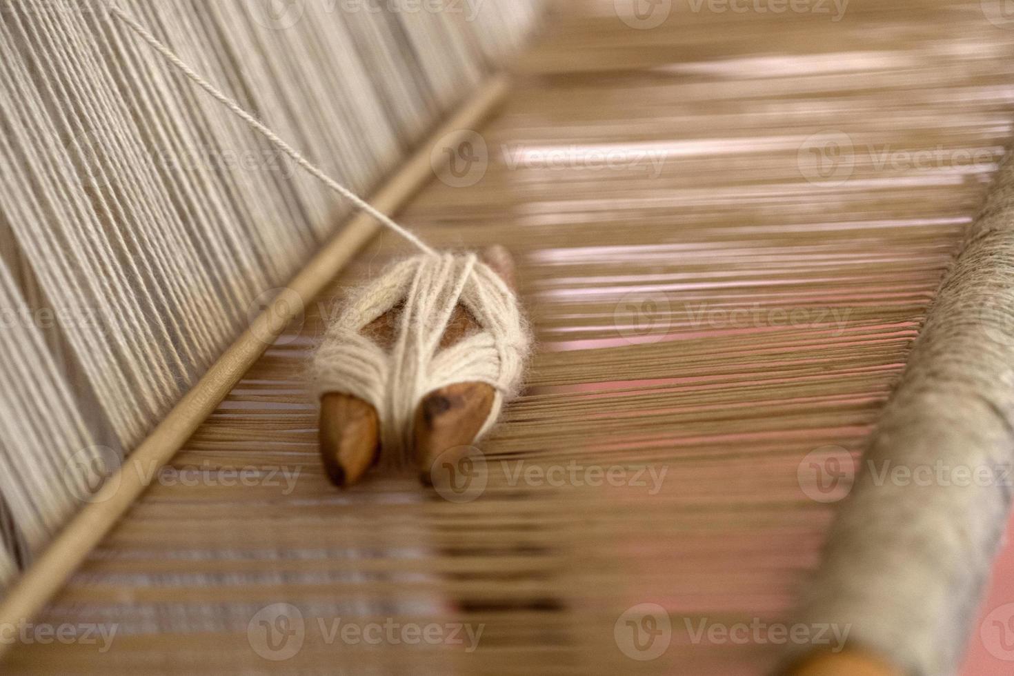 Ancient textile machine close up photo